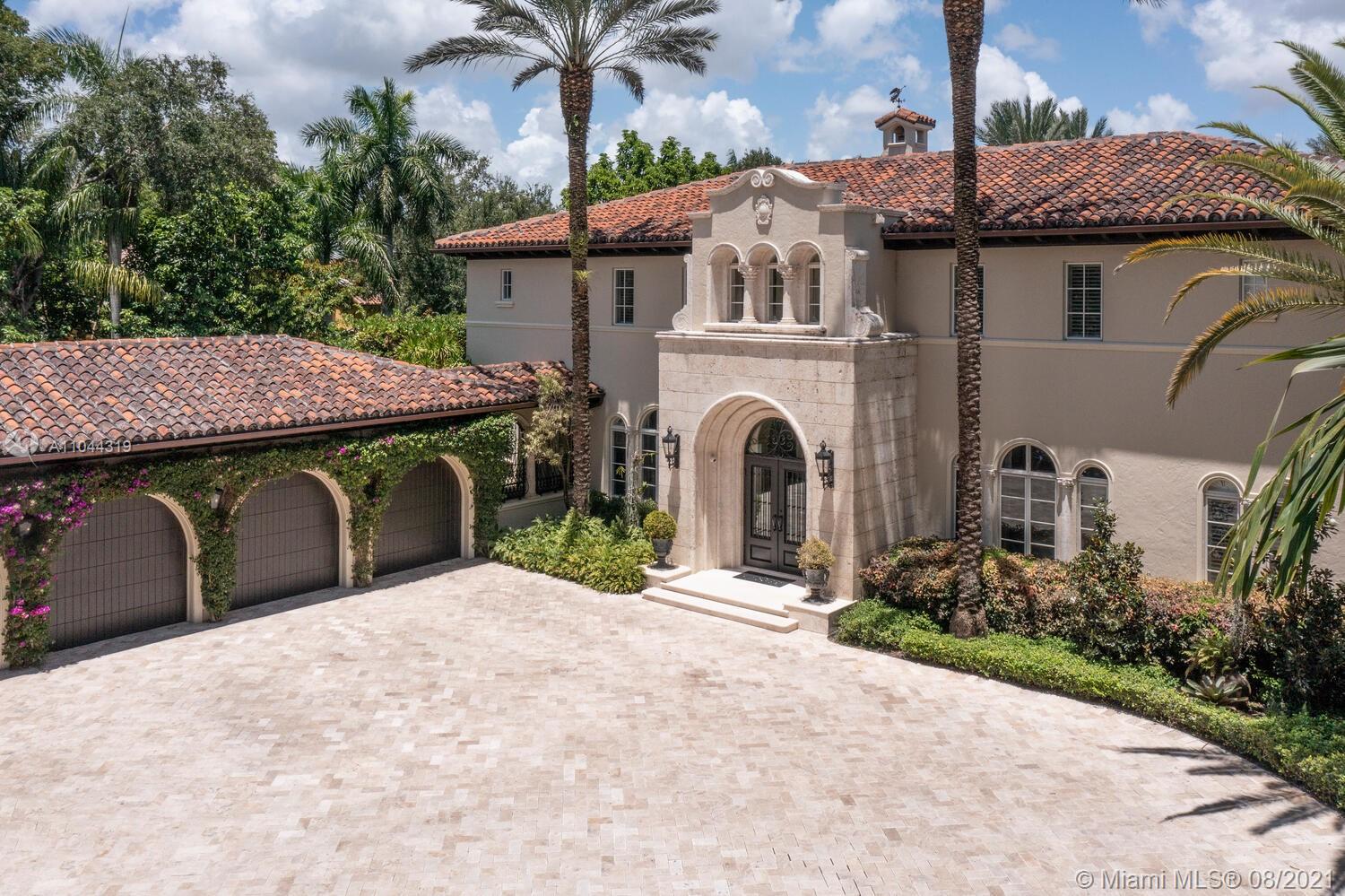 Elegant estate in the neighborhood of sought-after Ponce Davis. This custom gated 12,565 sq. ft. home's layout is best for entertaining. Main house has 5 en suite bedrooms & 2 half baths, a gym + library/office + wine tasting room & 1,100 bottle wine storage room + billiards room + family room & more.  A 1/1 guest house with a kitchen and ample living area completes this gem.  A state-of-the-art kitchen offers a professional Viking gas range + Miele coffee maker + Sub-Zero fridge & more.  The summer kitchen has a chef's gas range, sinks, bar plus an adjacent massage room.  Additional details: a state-of-the-art sound system, full house generator, professionally landscaped hidden gardens and fountains, as well as a 4-car garage. This residence has all you need for an extended time at home!