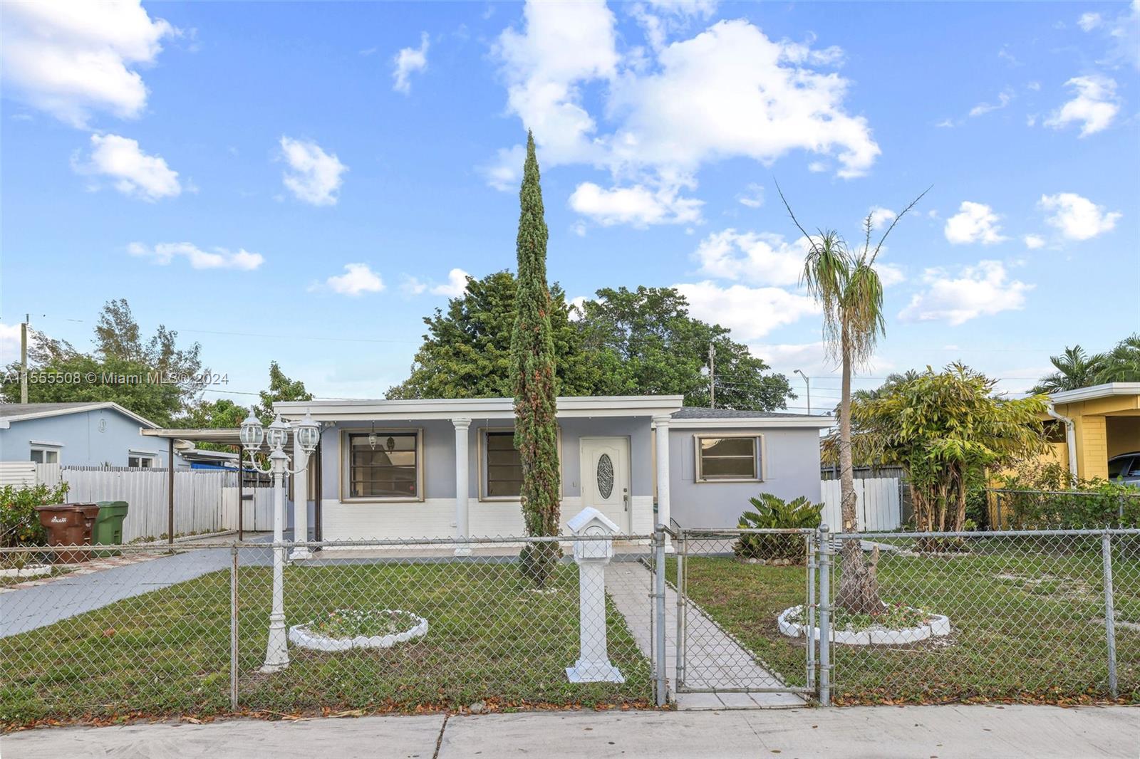 Introducing a charming haven nestled in the vibrant city of Hialeah - a delightful 4-bedroom, 2-bathroom retreat exuding warmth and modern allure. This home has undergone a captivating transformation, boasting an updated decor that seamlessly blends style with comfort. Step inside to discover a spacious interior adorned with thoughtful details and inviting ambiance. The open layout beckons you into a welcoming living space, ideal for relaxation or lively gatherings. With four bedrooms, there's ample room for family and guests to find their own sanctuary, each exuding its unique charm. Venture outside to unveil a generous backyard oasis, complete with flourishing fruit trees and ample space for outdoor entertainment.