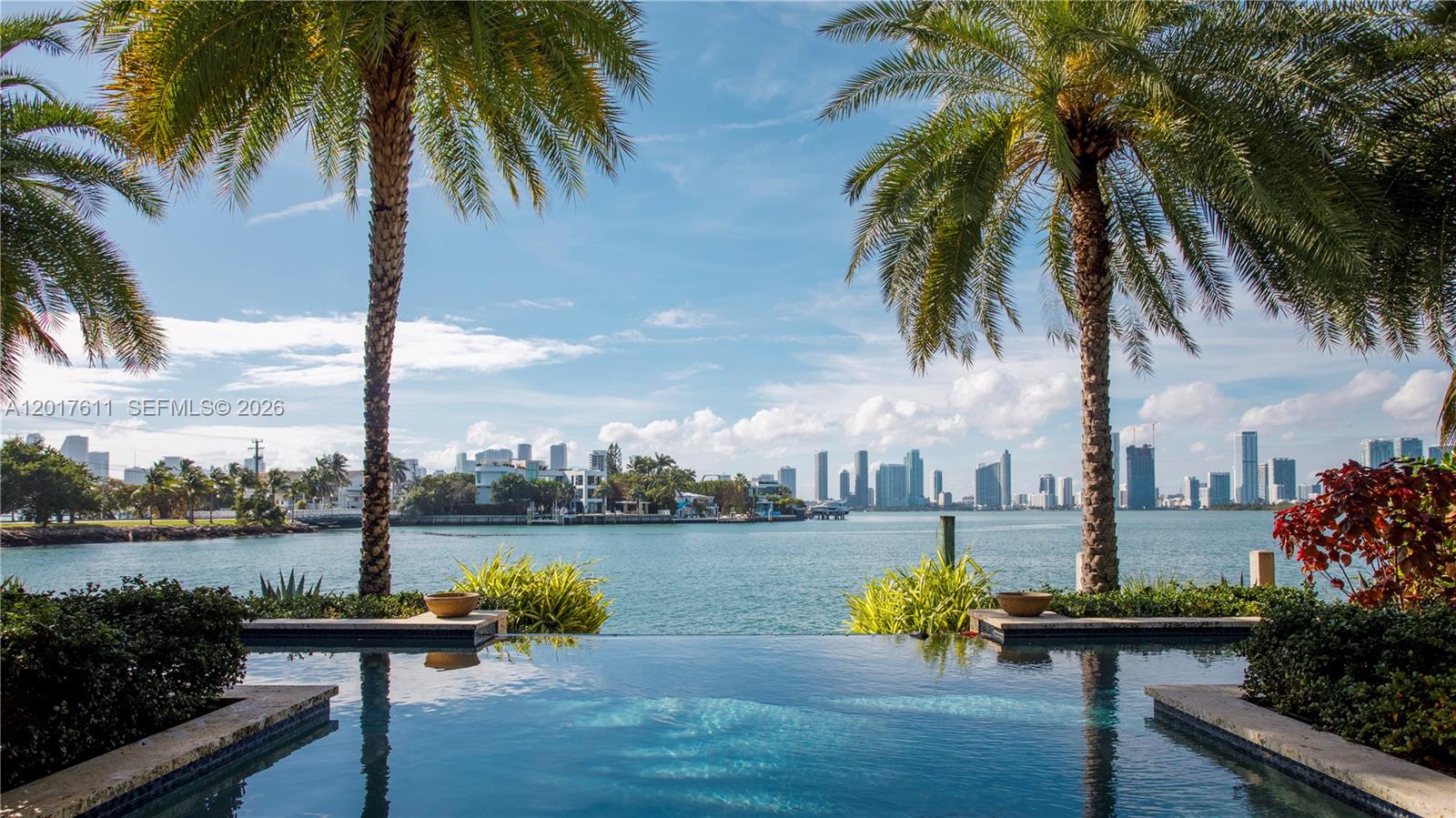 Back on the Market.
-DOUBLE LOT- ON THE WATER WITH ONE OF THE MOST MOST EXCLUSIVE AND MOST SPECTACULAR CITY VIEWS ON VENETIAN ISLAND WITH 120FT OF WATER FRONTAGE WITH A LARGE LAP POOL. THIS EXCLUSIVE AND WELL MAINTAINED HOUSE FEATURES AN OPEN FLOOR PLAN, GOURMET KITCHEN DIRECTLY FACING TO THE WATER AND EXPANSIVE OUTDOOR LIVING SPACE WITH SUMMER KITCHEN AND CABANA BATH. EIGHT CAR GARAGE UNDER THE A/C (FOUR CAR LIFTS) WITH IT'S PRIME LOCATION,JUST MINUTES AWAY FROM SOUTH BEACH AND THE BEACHES, DOWNTOWN MIAMI AND THE DESIGN DISTRICT.YOU MAY ENJOY THIS HOUSE AS IS OR POSSIBLY TO BE BUILT A HUGE MANSION OR POSSIBLY TO BE DIVIDED INTO TWO LOTS TO BUILT TWO HOUSES.