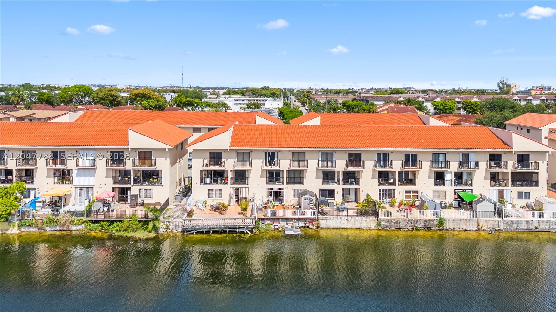 Rarely available ground-floor opportunity with tremendous upside potential to renovate and add value, sold AS-IS, priced accordingly. This large, bright 2-bedroom, 2-bath residence features an oversized private terrace and breathtaking, wide unobstructed lake views. Located in one of the area's best-maintained communities, featuring a newly painted exterior, a new roof, and ample parking. Enjoy a safe, centrally located neighborhood just minutes from shopping, dining, and major highways. Situated in one of Hialeah's most consistently high-occupancy rental markets, this property is an excellent opportunity for investors seeking strong cash flow, long-term appreciation, or buyers looking to customize a waterfront home to their own taste.