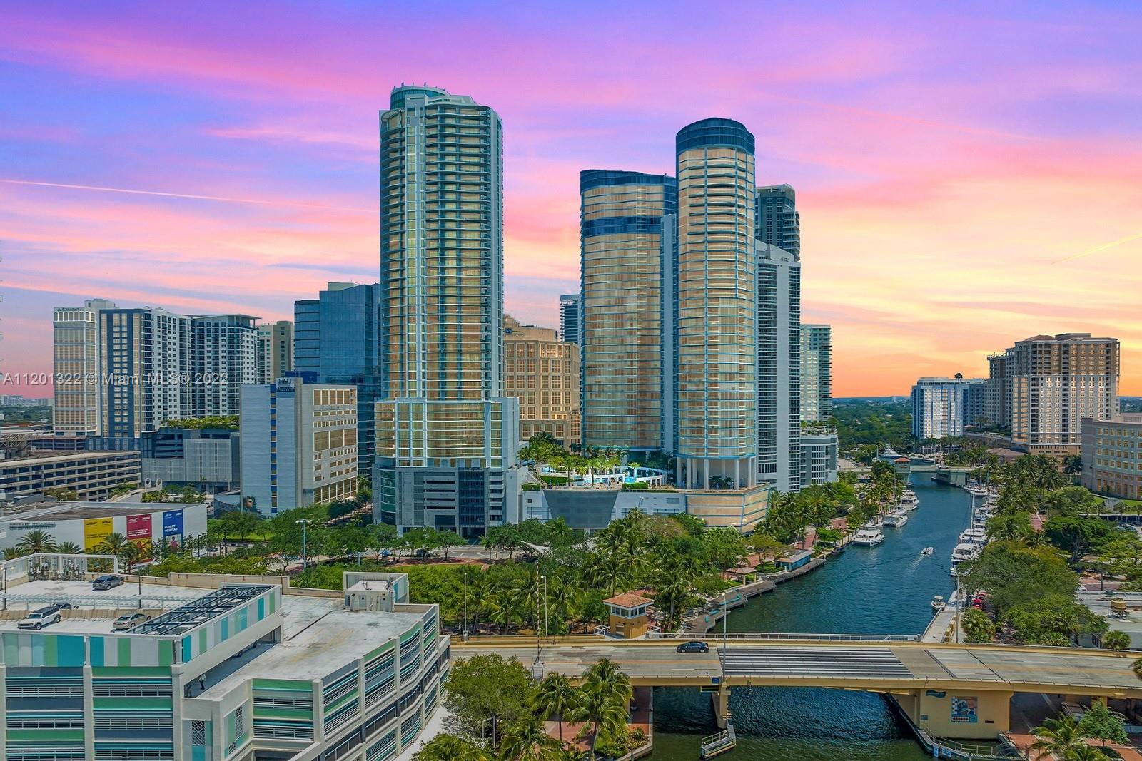 ICONIC LAS OLAS RIVER HOUSE AWAITS. AS DOORS OF A PRIVATE ELEVATOR OPEN TO THE 20 FLOOR, TAKE IN DECADENT CITY & NEW RIVER VIEWS FROM FLOOR TO CEILING WINDOWS. OPEN & COMPLETELY REMODELED FROM TIP TO TOE. GOURMET CHEF'S KITCHEN HAS CUSTOM QUARTZ-TOPPED CABINETRY, DOUBLE WALL OVEN, WINE FRIDGE, & COMMERCIAL GRADE REFRIGERATOR. A SPECTACULAR PRIMARY SUITE WITH PRIVATE TERRACE OFFERS AN OVERSIZE CUSTOM CLOSET. THE ENSUITE BATH SHOWCASES MODERN DESIGN AT ITS FINEST. PRIVATE LAUNDRY. INDULGENT FIRST CLASS AMENITIES DESIGNED BY THE AWARD WINNING STEVEN G. LOHR INCLUDING AN IMPRESSIVE LOBBY WITH KOI POND, WORLD CLASS FITNESS CENTER, SUN DRENCHED POOL DECK, & VALET PARKING. WALKABLE TO WORLD CLASS SHOPS, RESTAURANTS, & GALLERIES. JUST MINUTES TO THE MOST PRISTINE BEACHES.