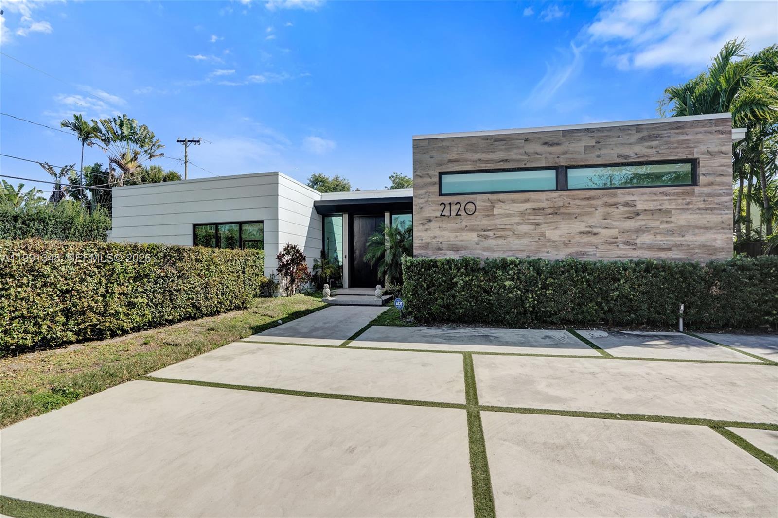 Ultra-modern architectural masterpiece built in 2020 in the Skylake/Aventura area. This stunning gated residence offers 5 en-suite bedrooms, 5 full baths and 2 half baths (powder room & cabana bath), set on a generous 14,455 SF lot.
Spectacular open floorplan with soaring 10-ft ceilings and floor-to-ceiling impact glass doors that flood the home with natural light. PGT impact windows throughout. The showstopping gourmet Veneta Cucine kosher double kitchen features dual Sub-Zero refrigerators, dual wall ovens, dual dishwashers, dual sinks, and gas stovetops, & Espresso Machine —  Wolf & Sub-Zero appliances — built for serious entertaining. Italian porcelain floors, Legrand fixtures, and motorized window treatments elevate every detail. A brand new roof (Dec 2025) with solar panels, Tesla batteries, Tesla car charger installed and storage shed, ensure superior storm resilience and energy independence. Seamless indoor/outdoor living flows to an expansive terrace and resort-style heated pool — the ultimate South Florida lifestyle.
A true turn-key luxury offering in one of Miami-Dade's most desirable neighborhoods.