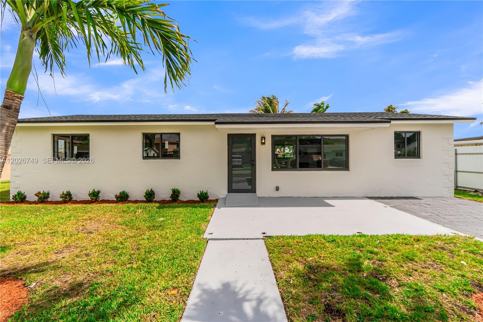 Beautifully remodeled 3BD/2BA home in a family-oriented neighborhood with strong growth potential! This turnkey property features a new permitted roof, impact windows & doors, PVC plumbing, updated electrical outlets, switches & fixtures, new porcelain flooring in social areas, and quality waterproof laminate flooring in bedrooms. Enjoy refinished walls, solid wood kitchen cabinets, quartz countertops, stylish bath vanities and new water heater. Additional upgrades include a new paver driveway. Spacious lot offers room for a pool plus side access for boat, RV, or other recreational vehicles. Stainless steel appliance credit to be provided by seller at closing. Thoughtfully renovated with attention to detail and quality finishes throughout.