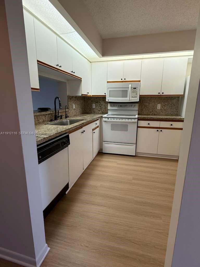 CAMBRIDGE AT CENTURY VILL - Residential
