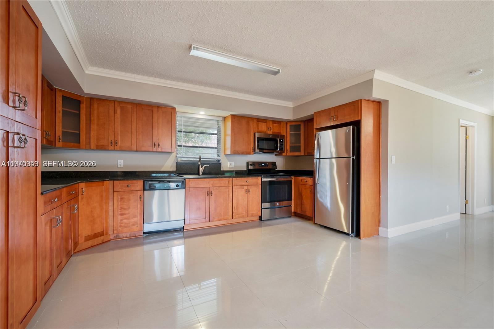 Beautiful one-story home boasting clean tile and an open floor plan. The gourmet kitchen features tons of storage and stainless steel appliances. Combo family and dining has many windows letting in lots of natural light. Large primary bedroom with fresh paint and ceiling fan. Additional 2 bedrooms and laundry room are spacious. The backyard has covered patio and grand grassy area is the perfect spot to entertain.beautiful deck, PLENTY OF FRUIT TREES !Roof and a/c just a few years old. Solar panels .