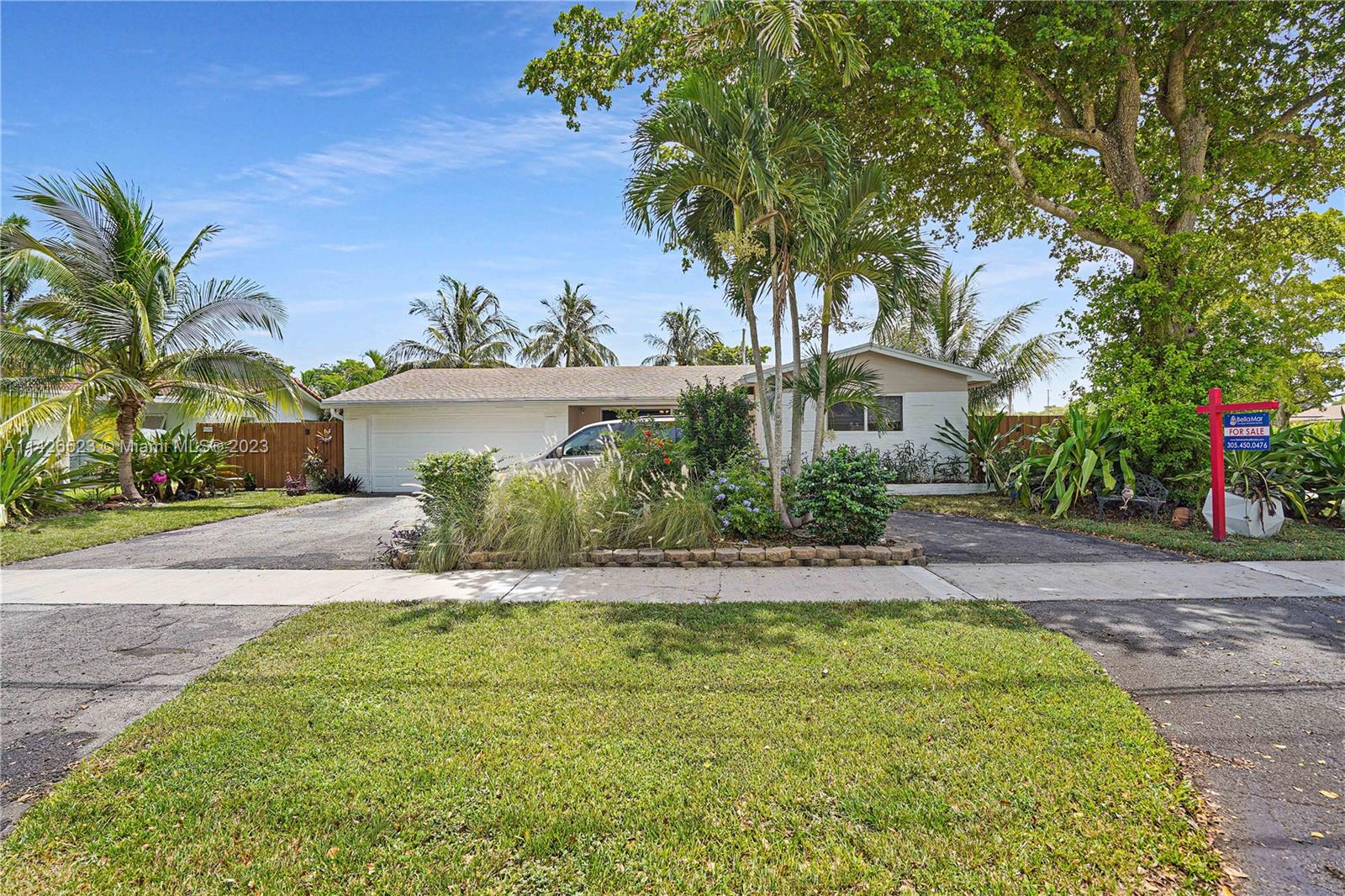 Welcome to this highly desirable corner lot home in coveted Hollywood Hills, boasting 3 Bedrooms & 2 full Baths. Upgraded kitchen & baths, bright & airy open floor plan. Ceramic floors, beautiful custom kitchen, granite counters, custom wood cabinets & SS appliances. Kitchen opens to formal dining room & spacious living room with natural light, laundry room, pantry, impact windows & doors, Rainsoft purification system. Unwind & cool off under the large covered & screened patio. Extensive yard with room for pool, outdoor kitchen & storing recreational vehicles, beautifully landscaped. Oversized corner lot with patio side access, fence installed 2016, the roof was replaced in 2020, attached two car garage, circular driveway for multiple vehicles. Parking for Boats, Rvs & commercial vehicles.