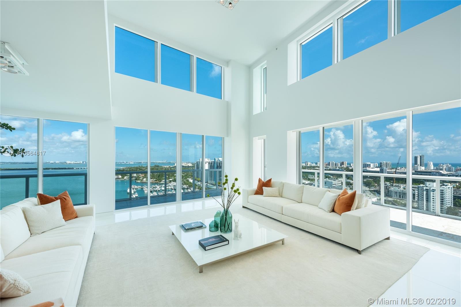 Nearly 360 degrees of unobstructed and absolute panoramas in all directions immediately command your attention form this impeccably reimagined, ultra-modern bi-level, corner loft Penthouse. Perfectly perched above it all on the Venetian Islands, PH04 delivers privacy and creme de la creme living in SoBe. Imagine life in the sky w/dramatic 20' ceilings capturing all sunlight shows, a dreamy sailboat heaven, ArtDeco & Miami skylines! Inherit the artistry of a $2m upgrade featuring custom Arclinea chef's kitchen, Miele-LaPerla/SubZero, climate controlled wine+cava, Crestron/Lutron, invisible surround-sound, iPad & Kreon lighting. Second-level master presents a floating sitting-room, Waterworks spa bath/steam, SS/marble fireplace & his/hers walk-ins. New resort pool/cabanas/grill/gym/tennis.