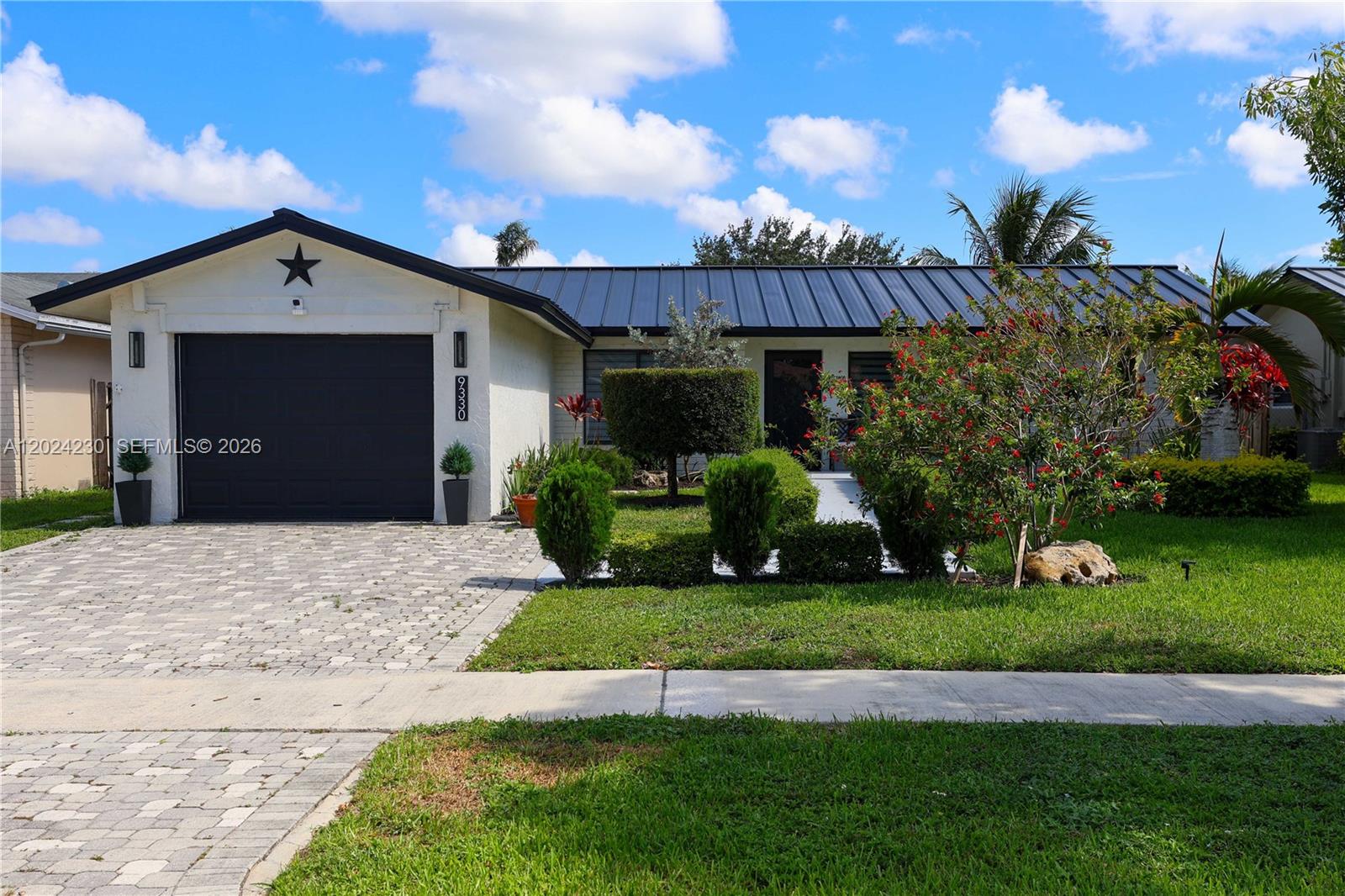 Move-in ready modern 3-bedroom, 2-bath ranch-style home with a private pool and major upgrades throughout! - Located on a culdesac in the highly sought out community of Welleby Isles. This open-concept home features a BRAND NEW METAL roof, MODERN HURRICANE IMPACT WINDOWS AND DOORS THROUGH OUT ENTIRE HOUSE and a hurricane-rated garage door for added security and HUGE INSURANCE SAVINGS!!
Enjoy easy maintenance with porcelain tile flooring throughout and a split-bedroom layout offering privacy and functionality. The spacious living and dining areas flow seamlessly, making this home ideal for everyday living and entertaining. UPGRADED KITCHEN with QUARTZ counter tops and 42 inch custom cabinets. NEW electric range, SS appliances, modern undermount sink and TANKLESS electric water heater. Bathrooms are FULLY upgraded with frameless shower doors and modern oversized porcelain tiles. 
Step outside to a fully equipped backyard featuring an insulated aluminum roof and private pool. GREAT for the Florida summer days. Gazebo with lighting and ceiling fan—perfect for relaxing or hosting guests.
Don’t miss this opportunity— A+ RATED Elementary school, close to award winning Sawgrass Mills, Amerant Arena and soon to open Baptist Hospital. 25 minutes from Downtown Las Olas - FTL and the beaches. Ready for its next owner!