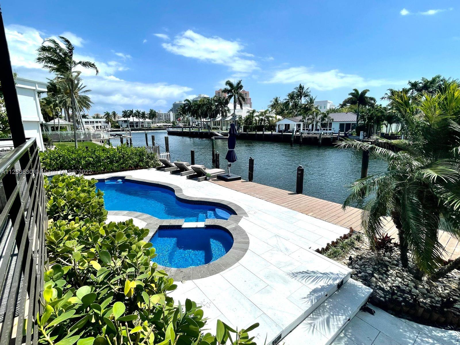 This Coral Ridge home is located in the boating capital of the world, Fort Lauderdale and is a boat enthusiast's dream!!! Three homes from the point! Conveniently located in between both ocean inlets, 100 feet of waterfront with no fixed bridges, ocean access and a wide canal that's perfect for a yacht! The completely renovated home features 5 bedrooms, 4 bathrooms with a split master plan and a large terrace with views of the pool deck. This home epitomizes indoor/outdoor living! Also, great house for Vacation Rentals!!! List price does not include furniture but owner would consider selling it furnished for a higher price.
