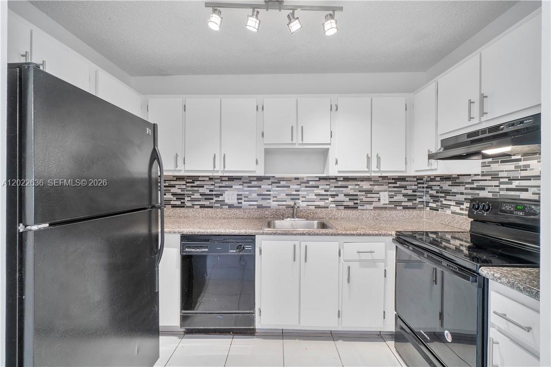 INVESTORS WELCOME! Spacious and updated 2-bedroom, 2-bath condo located on the second floor in the desirable Spring Park community. Features include a modern kitchen with granite countertops, stylish backsplash, updated bathrooms, tile flooring throughout, and canal/garden views. Corner unit with assigned parking and guest parking available. New refrigerator, dishwasher, and washer/dryer hookup. Conveniently located near shopping, dining, and major highways. All ages welcome and OK to lease.