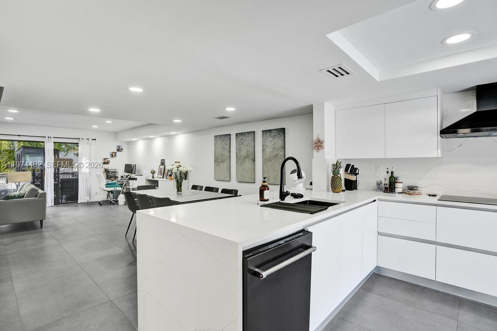 Welcome to This Bright and Spacious 1,600 Sq. Ft. Townhouse.
Offering the perfect blend of comfort and modern design, this beautifully maintained home features 3 generously sized bedrooms and 2.5 bathrooms, along with custom-designed walk-in closets providing exceptional storage.
The primary suite is a true retreat, complete with built-in closets, an additional entry closet, and a spa-like en-suite bathroom featuring dual sinks and a large shower. Enjoy the tiled balcony overlooking a peaceful garden view.
The modern kitchen is designed to impress, showcasing state-of-the-art stainless steel appliances, including a double wall oven and oversized hood, along with elegant granite countertops-perfect for cooking and entertaining. The living area opens to a large private patio, ideal for outdoor dining and gatherings.
Beautiful ceramic tile flooring runs throughout the home, adding a sleek and contemporary touch.
Additional highlights include a separate laundry room, tastefully upgraded bathrooms (one with multiple control functions, bidet), and a brand-new A/C system. Residents also enjoy access to the community pool and 2 assigned parking spaces.
Move-in ready and ideal for comfortable South Florida living!