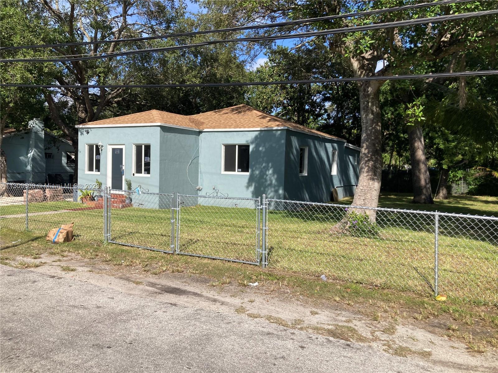 BEAUTIFULLY RENOVATED HOME IN THE MOST DESIRABLE AREA! Brand New 2022 Roof, impact-proof windows throughout, BRAND NEW kitchen with quartz countertops, new appliances, gorgeous ceramic tile floors, one-of-a-kind bathrooms, and so much more. Property has the potential to make into a 3/2 and a 1/1 or in-law quarters. Ideal location close to the beaches, Wynwood, Design District, Midtown, and Downtown.