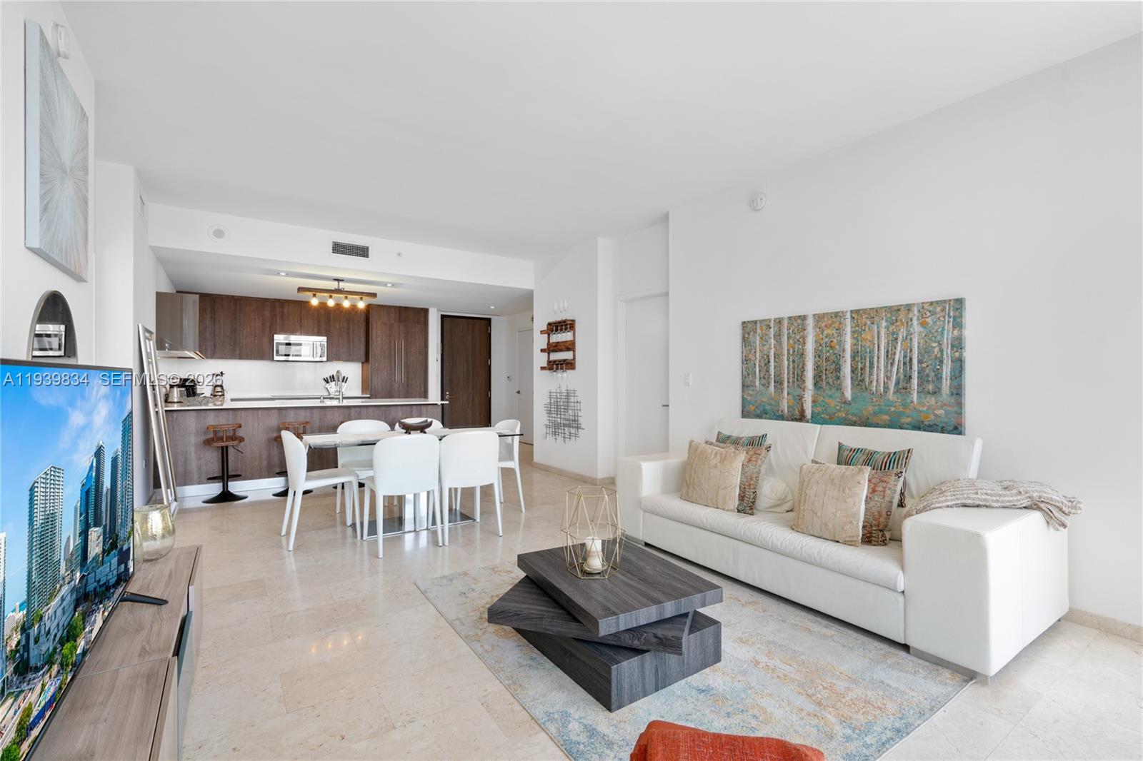 Beautiful 2 Bedroom, 2.5 Bathroom, designed by architectonic located in the heart of Miami’s financial District, modern Italian cabinetry for both kitchen and Bathroom, Bosh appliances, wine cooler, Mable floors, Building amenities included exercise room, Tea Lounge, Concierge and Galery, pool, party room, Children’s playroom, deck, spa and many more, restaurants & movie theaters, Basic cable/Internet all those included by condo association.