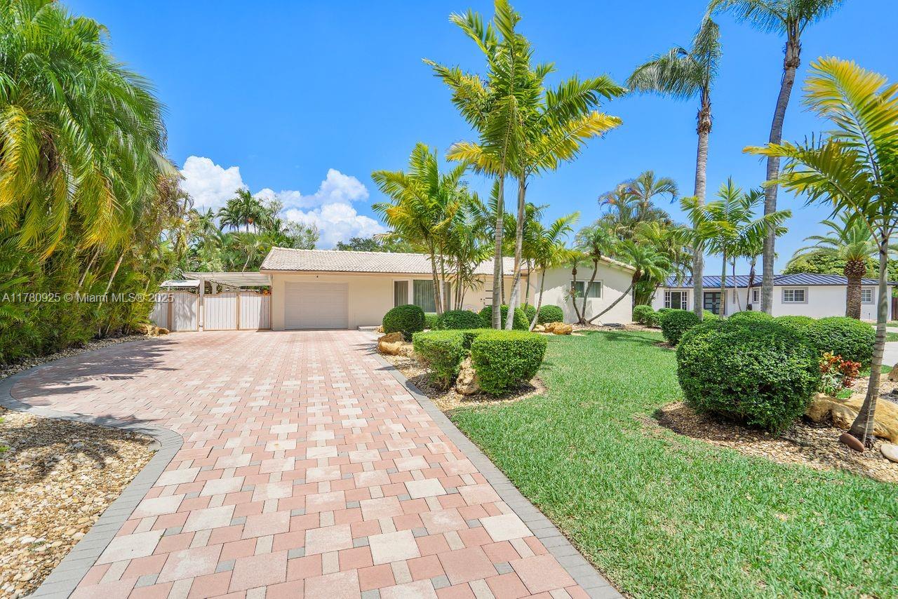 Heaven on earth, you won’t be disappointed. Village of Kendall. Cul-de-sac location. Professionally landscaped. Fountain for fish pond. Multi vehicle paved driveway. Fenced lot. Barrel tile roof. Custom front door, fully tiled flooring. Custom window treatments. Remodeled kitchen with granite countertops and remodeled bathrooms, security cameras, full-size washer and dryer, sparkling, open kidney shaped pool, storage and workspace, fruit trees, and barbecue easy access to locate shopping, MDX Expressway 874, Miami college, Baptist Hospital, walk to County Park. Show with confidence. See attachments.