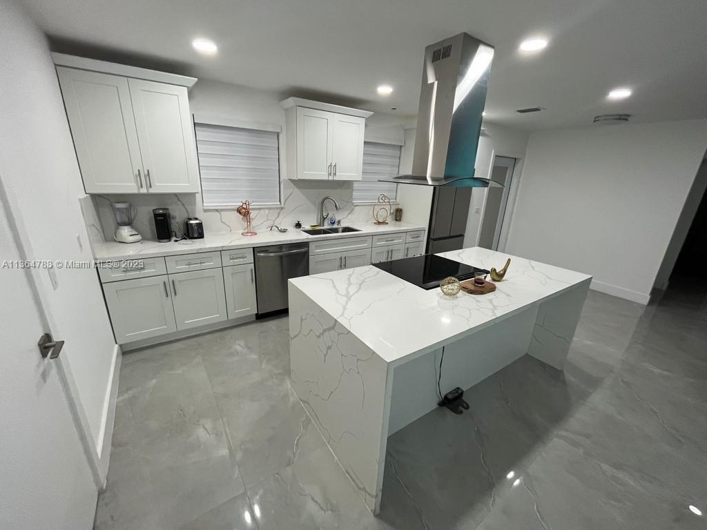 Beautiful Newly modern updated Home!! There is an additional room that can make it four bedrooms, but no closet. Plenty of living space with a large screen in the patio on the back. Very nice area. The home is centrally located, surrounded by stores, shopping malls, restaurants, and Hard Rock stadiums, which is excellent for Airbnb. This Won't last!!