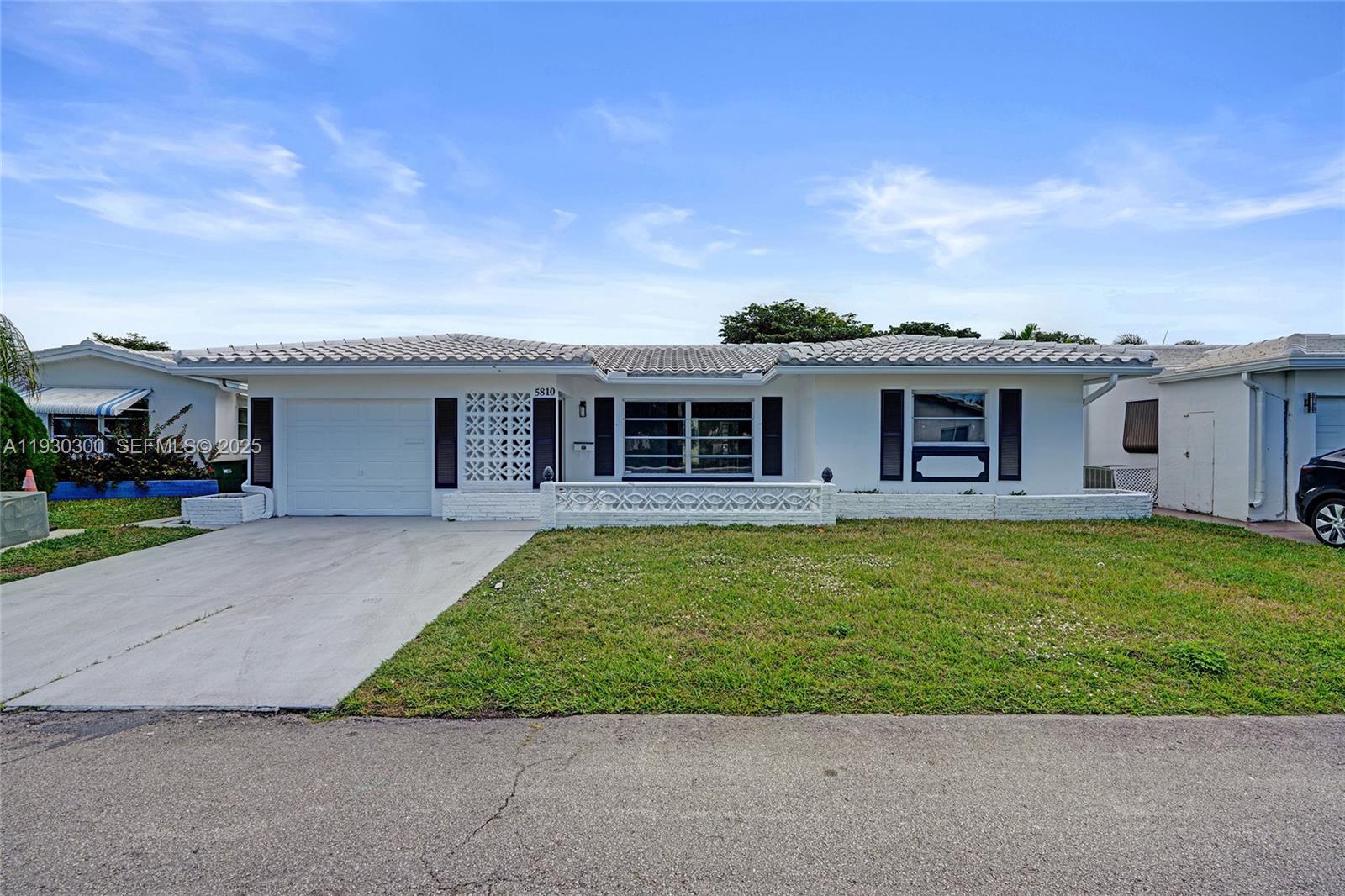 Welcome home to this beautifully updated waterfront residence located in a desirable 55+ community with an incredibly low $103/month HOA. Featuring a durable barrel tile roof and 1-car garage, this home offers both style and peace of mind. Step inside and fall in love with the brand-new laminate flooring throughout and a stunning kitchen that will truly blow your mind—complete with stainless steel appliances, quartz countertops, wine cooler, and abundant recessed lighting. Roof was replaced in 2004. Select impact windows add extra security and energy efficiency. The spacious layout includes a large living room and dining area, plus a separate family room, perfect for entertaining or relaxing. The huge primary bedroom boasts a generous walk-in closet, while the dedicated laundry room includes washer and dryer for added convenience. Enjoy tranquil waterfront views and the lifestyle this community offers.This home is FHA & VA approved, making financing easy. Ask us about our rent-to-own option—a rare opportunity you don’t want to miss. Schedule your private showing today!