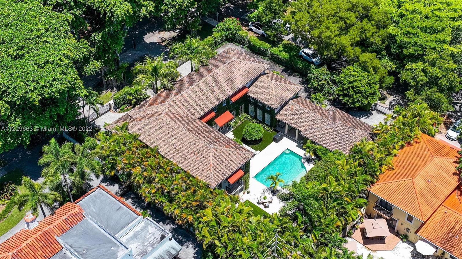 This gorgeous residence sits on a 16,500 Sq Ft Lot which is rare in Coral Gables. Walking into the home you feel the spaciousness & flow of the openness. You have beautiful views of the garden. This gated home features 11ft ceilings, marble & wood floors throughout, hurricane impact windows, custom theater,  2 master suites, library/game/computer area, Wolf and Subzero appliances with double freezer, refrigerator and wine cooler. The house is surrounded by lush & manicured landscaping, outdoor lounge area with plasma TV, 3-car air conditioned garage, generator for the entire house, saltwater heated pool and covered BBQ area with gazebo.  High-end technology throughout w/Nest thermostat, LED lighting, cameras and security.  Walking distance to Biltmore Hotel, Venetian Pool & Golf Course.