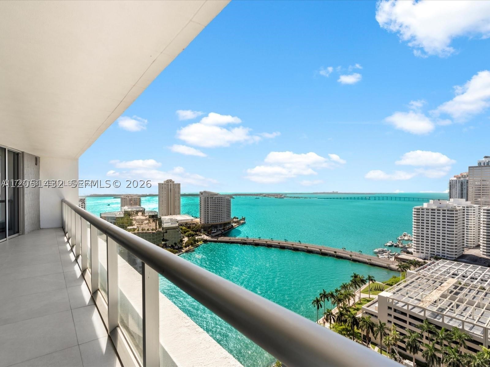 Recently updated, this exceptional residence at Icon Brickell offers 2 bedrooms, 2 bathrooms, plus a versatile den that can serve as a home office or third bedroom. The chef's kitchen features Sub-Zero and Wolf appliances, marble countertops with waterfall edges, and opens seamlessly to the spacious living area finished with elegant 36" x 36" porcelain tile flooring. The expansive private balcony showcases unobstructed panoramic views of Biscayne Bay, Key Biscayne, and the Brickell skyline. Spa-inspired bathrooms feature luxurious marble finishes, including a Kohler smart toilet in the primary bath. Available fully furnished. While Icon Brickell is renowned for its world-class amenities, the true highlight of this residence is its beautifully appointed interior and breathtaking water and city views.