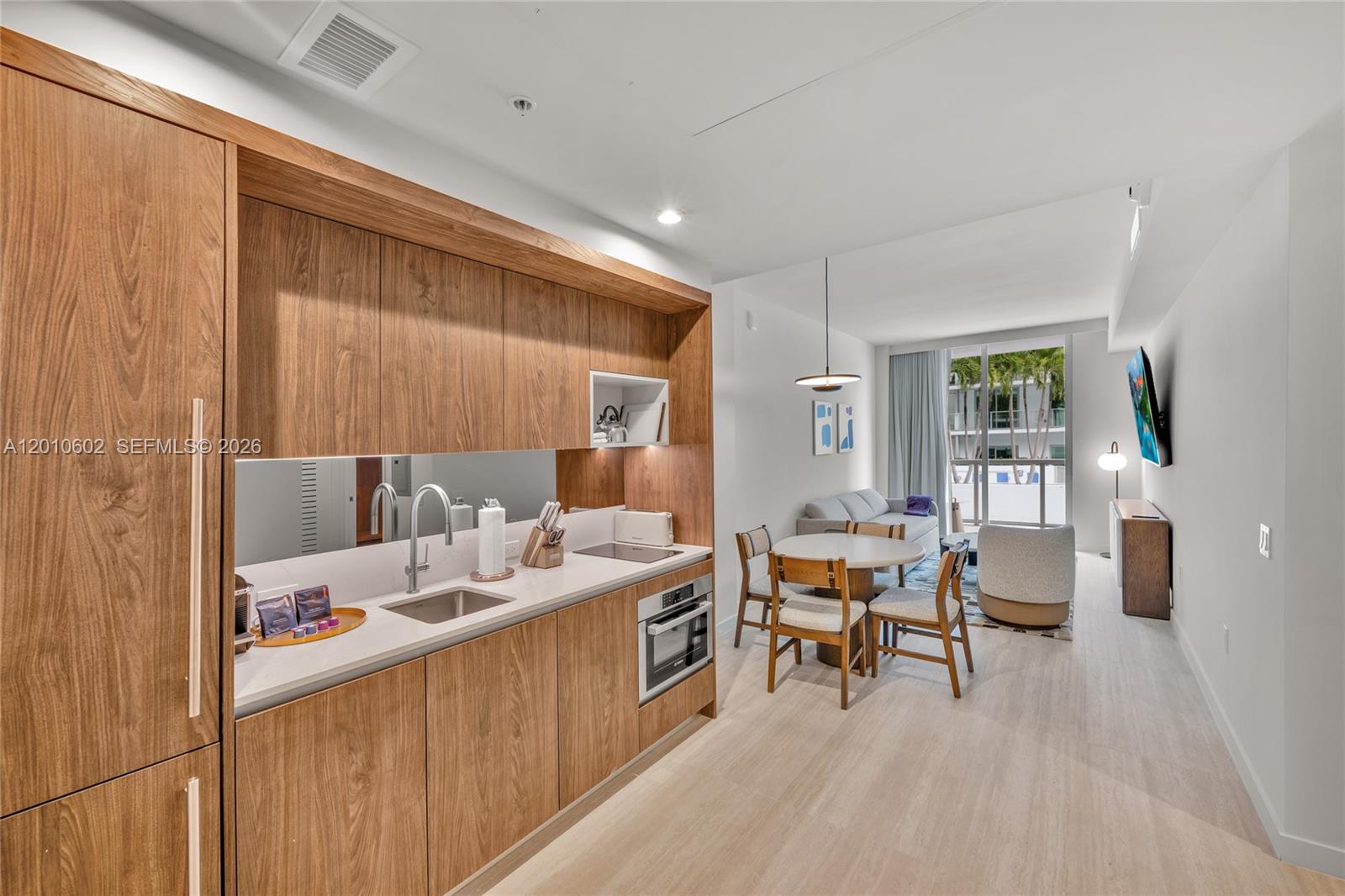 Turnkey income opportunity at Domus Brickell Park. Fully furnished 1-bedroom, 1-bath residence features a private balcony and a bright, modern interior with floor-to-ceiling glass, smart access, and premium appliances. Designed with flexibility in mind, the unit lends itself to both personal use and strong rental performance. Residents enjoy a full suite of lifestyle amenities, including a rooftop pool, fitness center, steam room, co-working lounges, café, and 24-hour security. Positioned in the center of Brickell, just moments from Brickell City Centre, the MetroMover, top dining, retail, and nightlife. Short-term rentals are permitted with daily, weekly, monthly, and annual options, making this an ideal choice for investors or a low-maintenance 2nd residence. Income-ready from day 1!