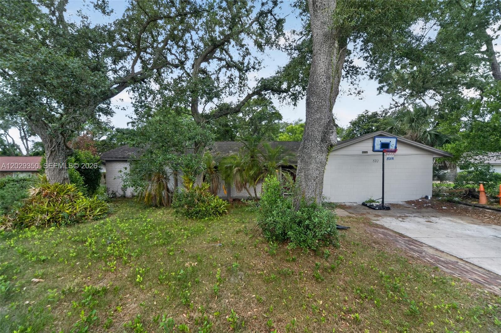 Amazing opportunity to own a spacious 3-bedroom, 2-bath pool home on nearly 1/2 acre (0.44 acres), offering rare outdoor space, privacy, and endless possibilities for entertaining, gardening, RV or boat storage, and future expansion. Conveniently located just minutes from Downtown Orlando, Camping World Stadium, international Drive, Universal Orlando Resort, Universal Epic Universe, SeaWorld Orlando, Walt Disney World Resort, shopping, dining, schools, and major highways, this property combines the comfort of a large homesite with easy access to Central Florida's top attractions, making it ideal as a primary residence, vacation home, or investment property.