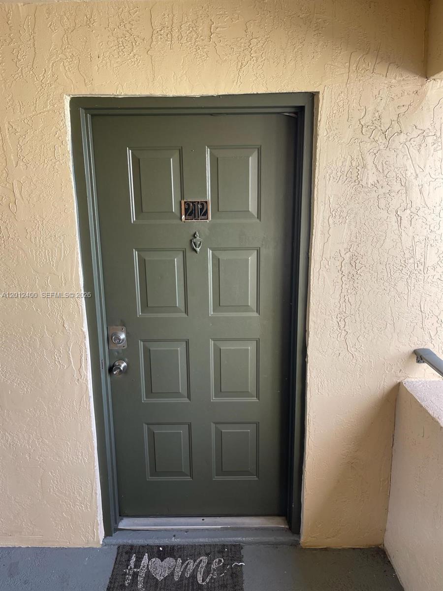 A spacious unit in Sunrise, FL 33322. This home features a washer and dryer, and a large open balcony. With wood laminate flooring throughout, this unit offers a cozy and elegant ambiance. SELLER REALLY MOTIVATED.
