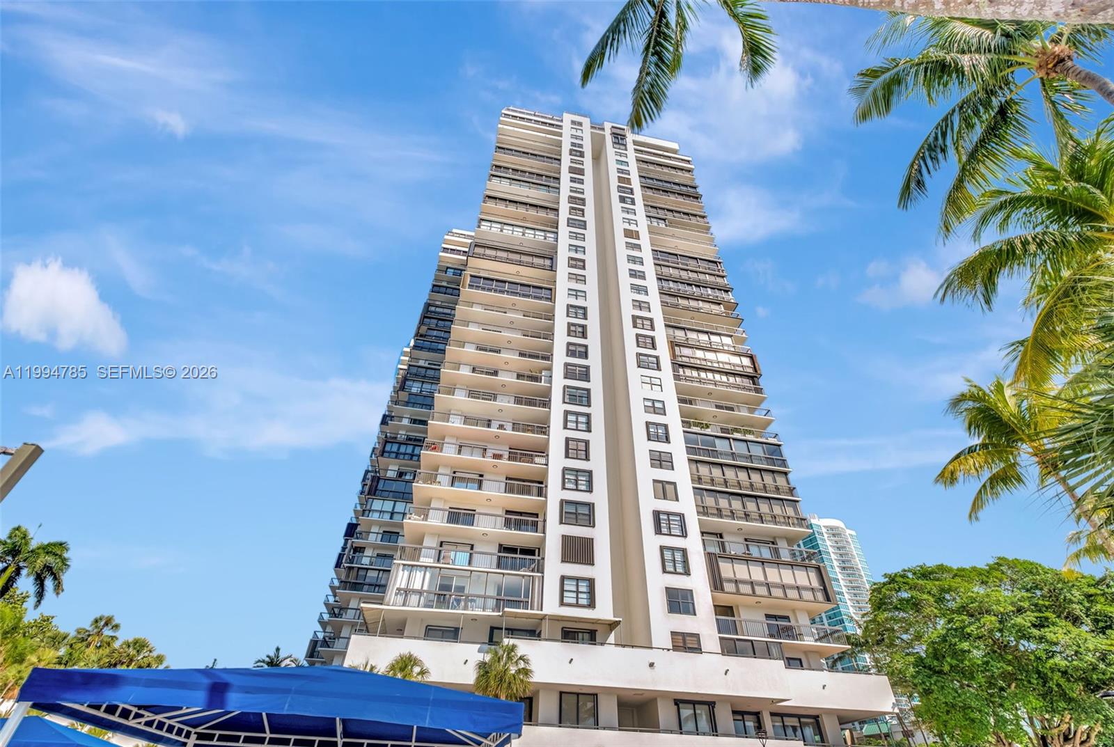 * (Enclosed balcony) Best priced 2 bed/2 bath unit per sq. footage.  Enjoy views of the bay and tennis courts from this beautiful condo featuring an enclosed wrap-around balcony for added living space (1760 sq ft) with room for den/office area to suit your needs. This bright and modern unit boasts porcelain tile flooring throughout, an open kitchen with granite countertops, spacious closets, and a separate laundry room. Experience resort-style living with 24-hour gated security, concierge, valet services, and top-tier amenities, including 5 tennis courts, 3 racquetball courts, a heated Olympic pool with a BBQ area overlooking the bay, fitness center, steam & sauna, game room, convenience store, and more. Easy access into the building and to I-95 , Brickell , Coconut Grove and South . Also available For Lease.