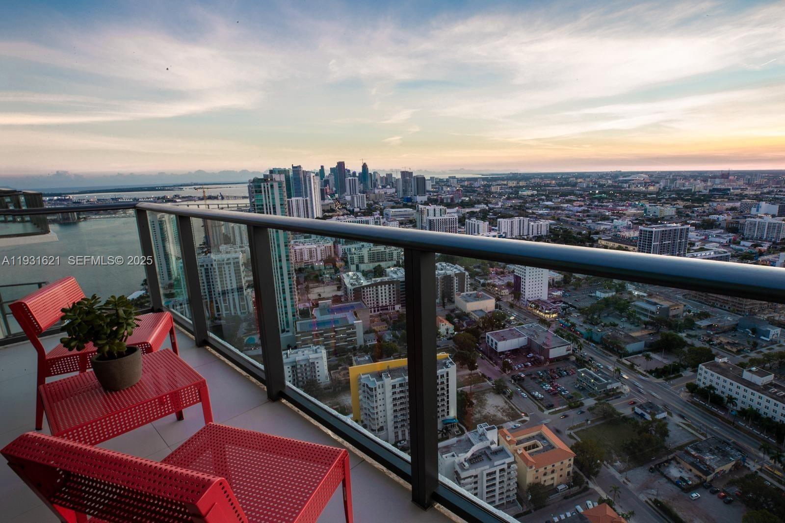 This PENTHOUSE  is the most spectacular and exquisite, designer-decorated and furnished 1 bedroom plus den at the Paraiso Bayviews. Yes, other units in the building may be furnished, but simply cannot compare to the level of this one. Lighting fixtures and scenes incorporated in every space, and equipped with all necessary utensils in the kitchen. Outside furniture and decoration in the balcony is magnificent and ideal to enjoy stunning views year-round. This building has 5-star amenities, such as a 24h attended lobby, state-of-the-art gym, rooftop pool and jacuzzi, tennis court, play room. No other furnished unit competes with this one.