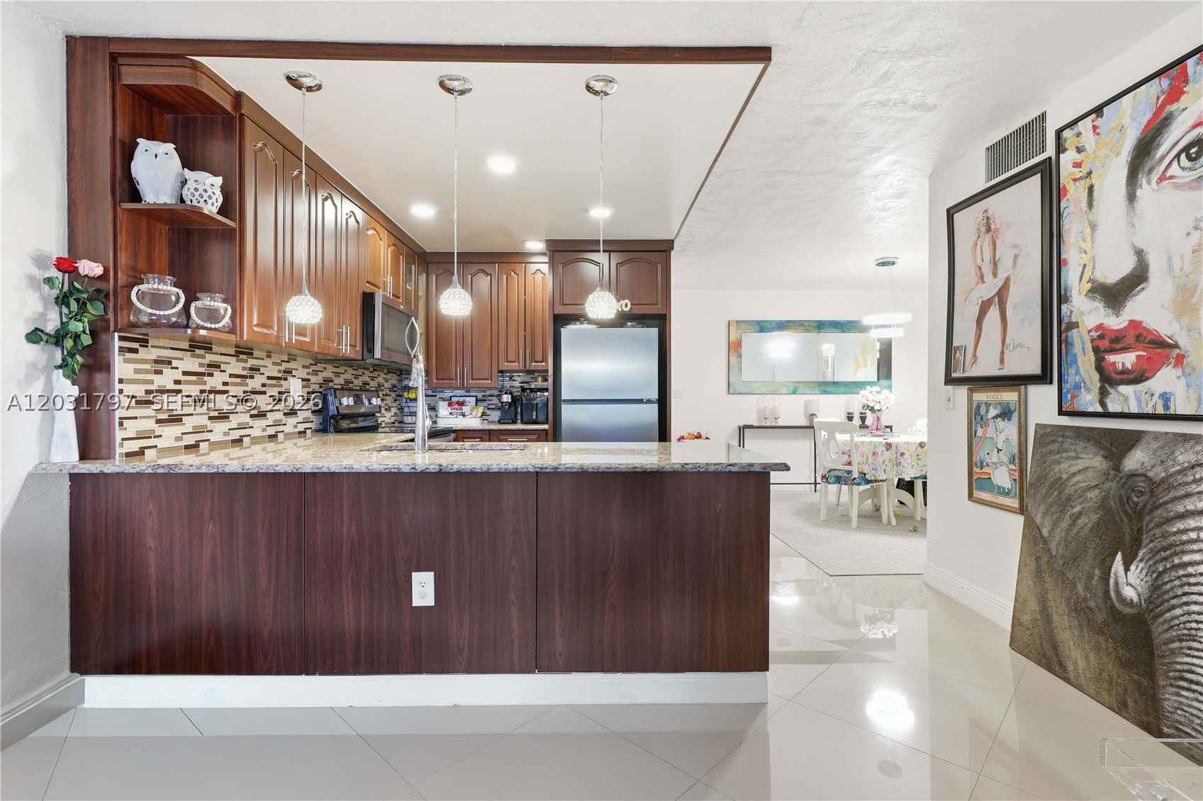 Fully updated 1 bed / 1.5 bath condo in one of Plantation's most desirable communities. Every detail has been thoughtfully refreshed — featuring a fully updated kitchen with stainless steel appliances, stunning porcelain in living and dining and vinyl laminate in the bedroom bath and closet, and a private enclosed balcony perfect for unwinding after a long day. This is truly move-in ready living at its finest. Residents enjoy a full suite of amenities including a pool, fitness center, clubhouse, and tennis courts. The community is quiet, well-maintained, and ideally located near top dining, shopping, and major highways — delivering the perfect blend of comfort and convenience. Don't miss this one — schedule your private showing today!