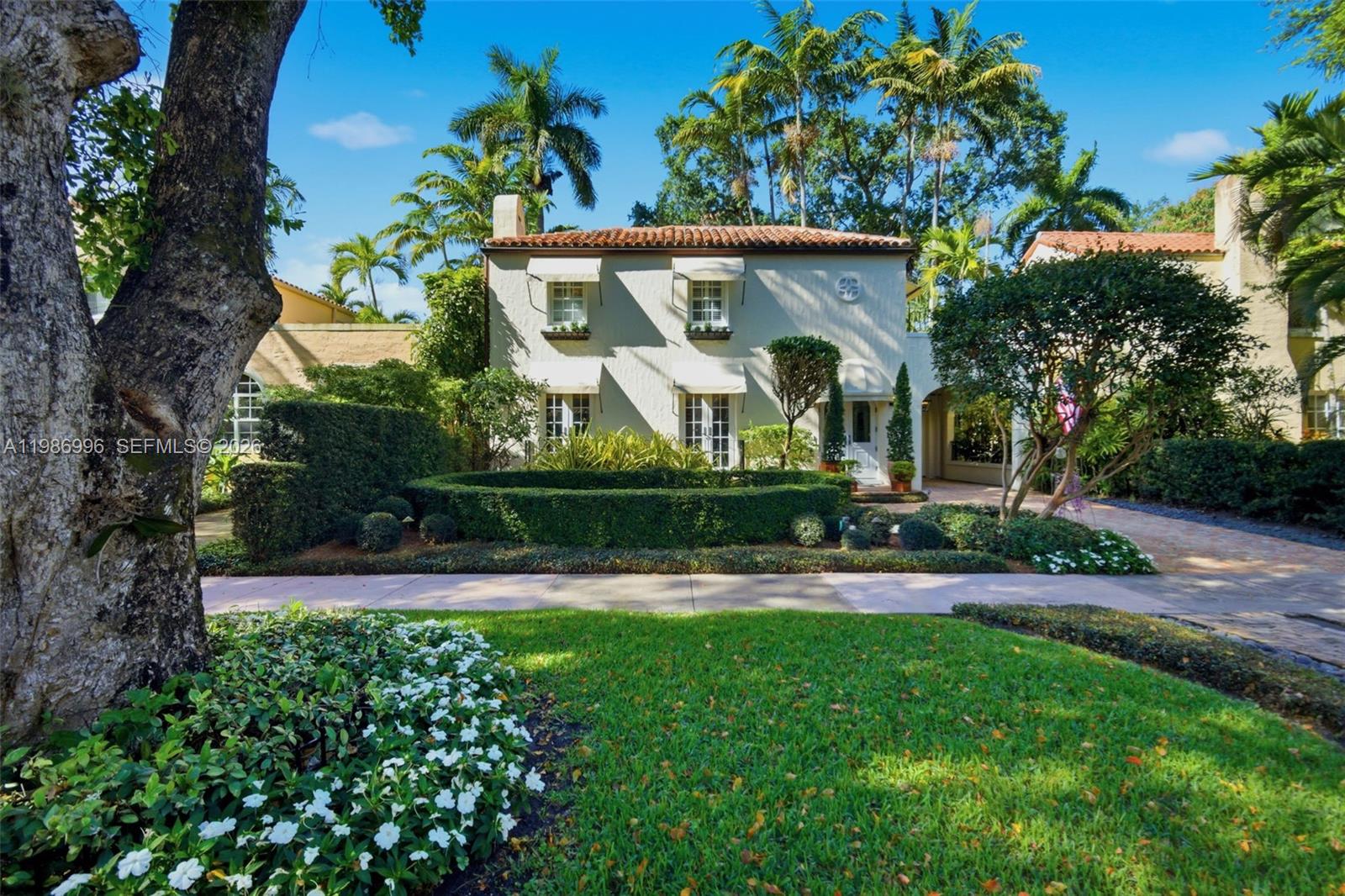 Price Adjustment on this impeccable residence presents an exceptional opportunity, thoughtfully positioned to generate immediate interest!! Step into one of Coral Gables’ most coveted historic treasures located in the Golden Triangle – a breathtaking 1928 Old Spanish Classic masterfully reimagined as a romantic Mediterranean Masterpiece, where timeless architecture meets luxurious modern living. This designated historic landmark, set on a beautifully landscaped lot just steps from the iconic Biltmore Hotel and Salvadore Park, features formal living and dining rooms displaying oak floors with walnut inlaid. Airy eat-in kitchen leading to private courtyard with spa-pool, logia, and guest/family quarters. The spectacular constructed guest house features a designer bath and a 2-car garage with custom wood doors decorated with ironwork. Enjoy the professionally landscaped formal and tropical gardens featuring Old Chicago brick driveway and shell stone patio – all combining to create an extraordinary residence where no detail was overlooked and no expense was spared.