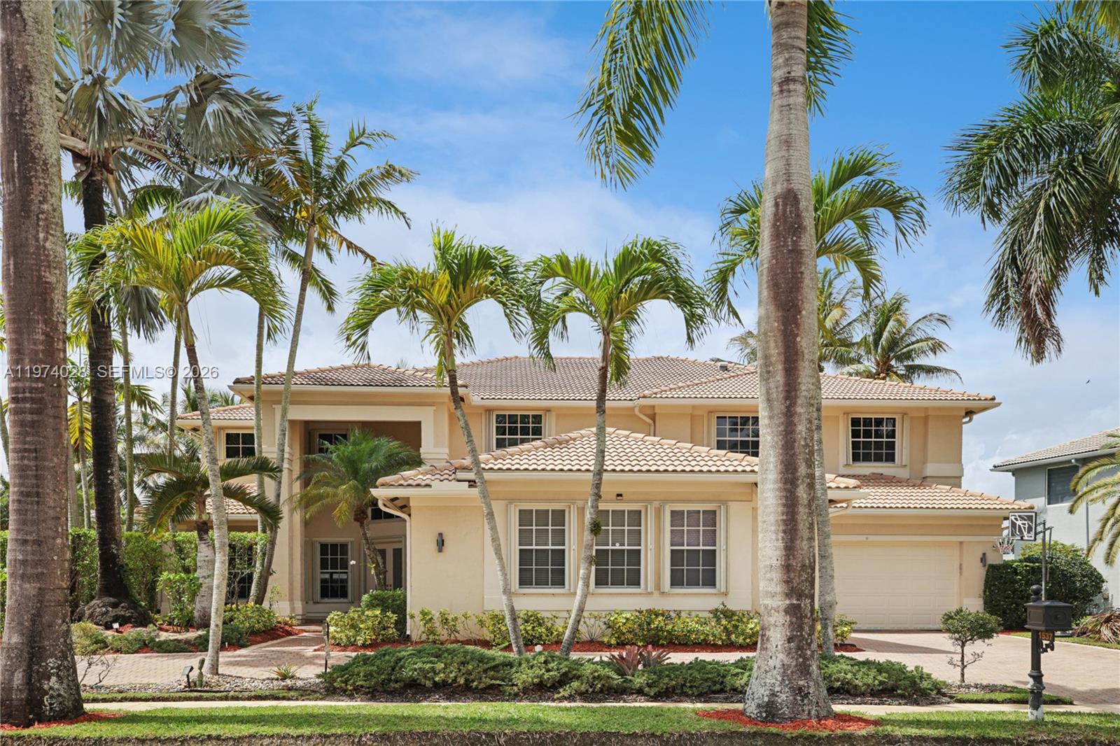 PRISTINE, LAKEFRONT, WESTON HILLS HOME, BRAND NEW ROOF ( WITH 8 YEAR TRANSFERABLE WARRANTY ) & OVER 5300 SQFT OF A/C LIVING SPACE. A RARE MULTI-GENERATIONAL ARCHITECTURALLY DESIGNED FLOOR PLAN WITH 1st FLOOR SUITE/GUEST HOUSE THAT OFFERS PRIVACY FOR ALL. 5/5.1, PLUS A PLAY ROOM, A DEN, OPEN LOFT AREA, POOL, 3 CAR GARAGE, SMART HOME. THE QUIET, SWEEPING LAKE VIEW IS IRREPLACEABLE WITH NO ROAD NOISE BEHIND YOUR HOME! Refined, Sophisticated Living w/ Expansive spaces for entertaining and comfortable everyday living. A Grand, Floating Staircase greets you at the Foyer and leads to the Private Master Retreat with a sitting room and a balcony. Enjoy your Morning Coffee from the Master Retreat's Covered Balcony (26x12 ft) and begin your day overlooking Peaceful, Serene, Sweeping Lake Views & your resort-style Pool, Spa, & Waterfall. Magnificent Sunsets will captivate you at the end of your day. Ambiance abounds! Renovated in 2023 in Today's  Contemporary Style, with thoughtful attention to detail. A detailed Feature Sheet is attached to the MLS. Weston Hills is a Desirable, Upscale Community in Weston, known for its excellent security and A+ Schools. YOU CAN MAKE THIS RARE, SOUGHT-AFTER, ARCHITECTURALLY DESIGNED HOME YOURS!