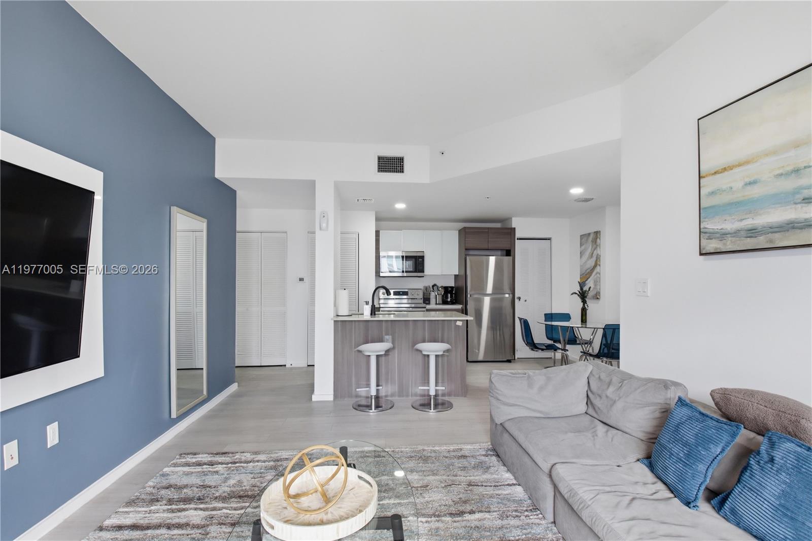 Airbnb condo! Experience the ultimate flexibility at the Emilia, one of Edgewater’s most coveted boutique buildings. This 2-bedroom, 2-bathroom residence is a dream for the savvy investor, offered fully furnished and ready for immediate short-term rental operation. Situated in a private 7-story building with no rental restrictions, this unit features a sleek, modern kitchen with premium Italian finishes and contemporary bathrooms. Step outside to a deep balcony where glimpses of the bay provide a picturesque backdrop for sunset cocktails. With its prime location just minutes from Wynwood, the Design District, and Miami Beach, this turnkey gem is perfectly positioned for high occupancy and seamless management.