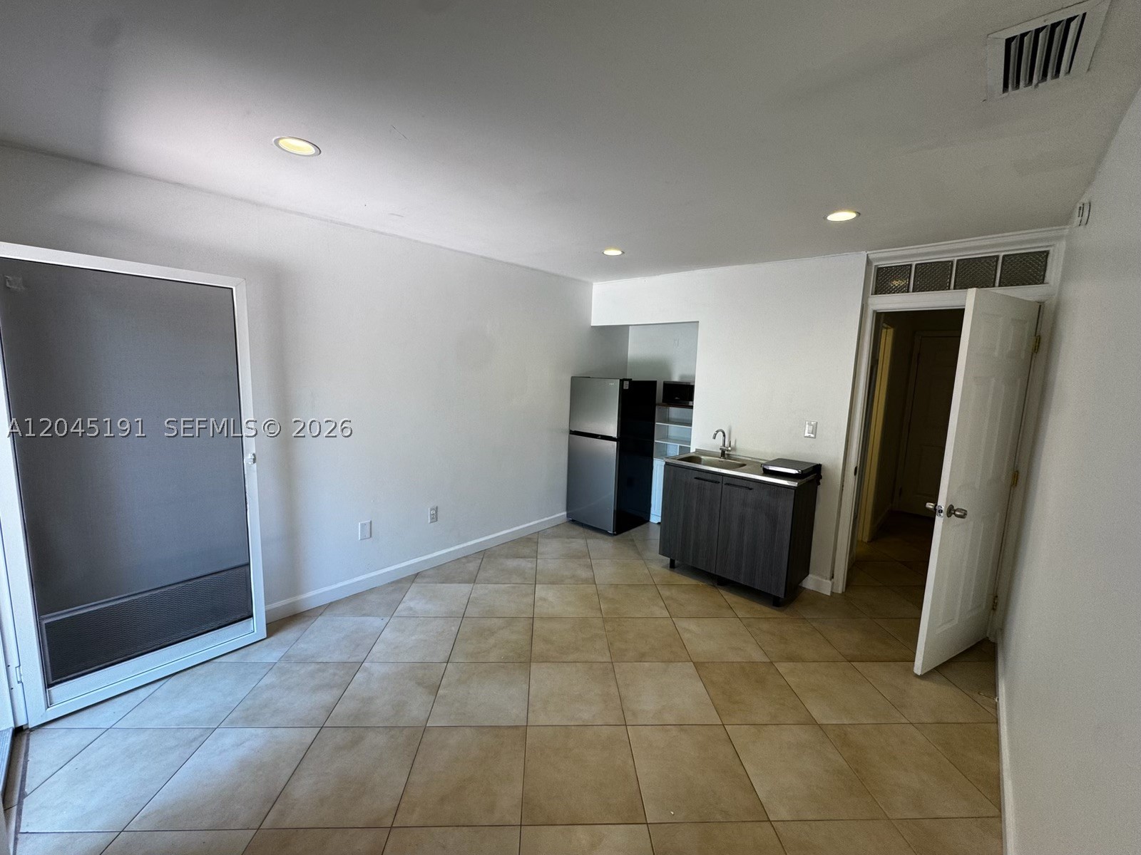 HOMES OF VERSAILLES CONDO - Residential Lease