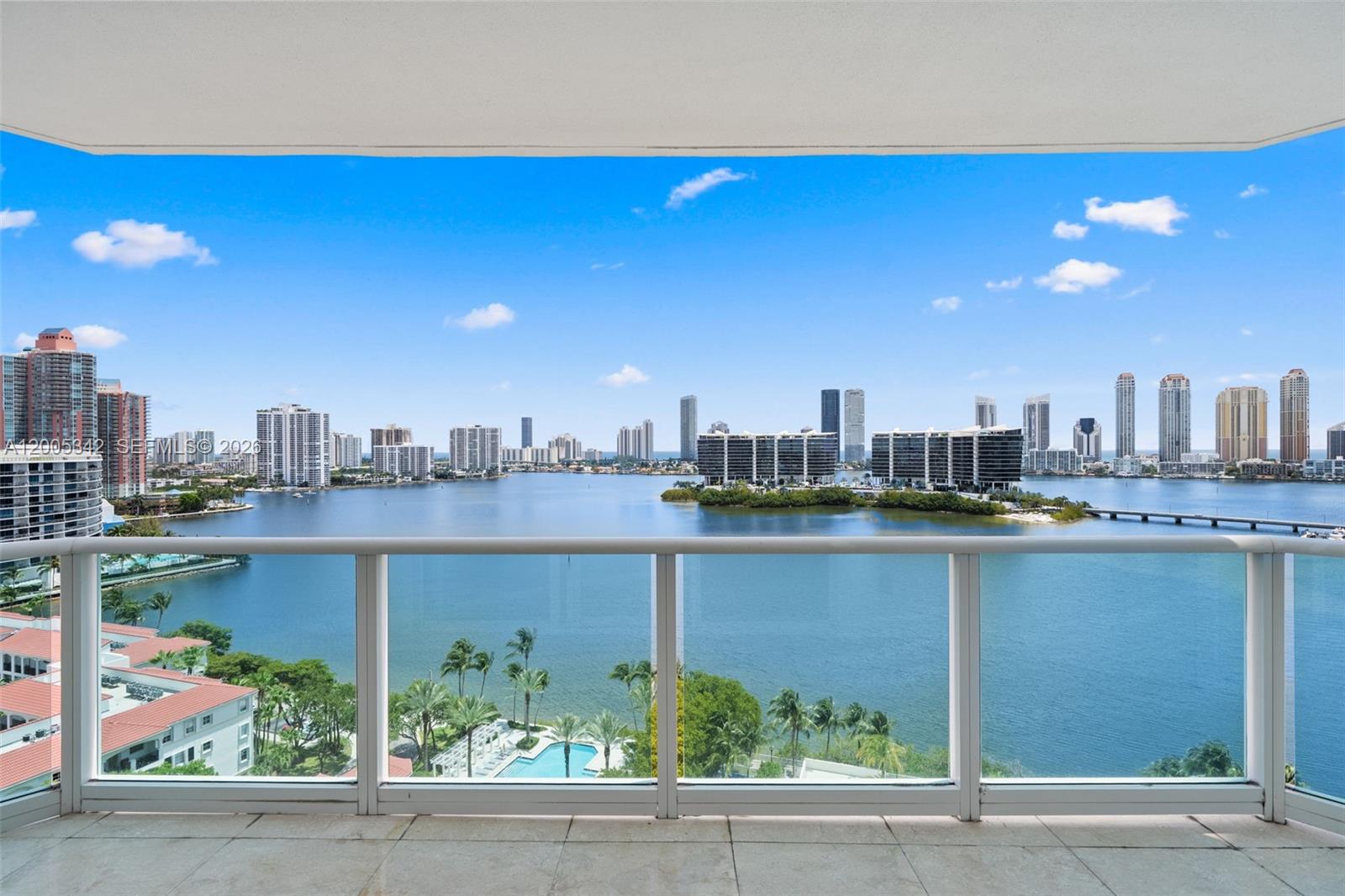 This spacious 4-beds, 4.5-bath residence, with over 3,400 sq. ft. of interior space, offers a thoughtfully designed floor plan with a flow-through layout. Enjoy stunning sunrises and panoramic views of the ocean and bay from the spacious balconies. The master suite features a private balcony, a walk-in closet, and a suite bathroom. Media room, laundry room. The Peninsula is a full-service building with 24-hour security, a grand lobby, and extensive recreational areas. Amenities include 2 swimming pools with towel service, 2 gyms, 3 tennis courts, a game room, and a dedicated dog walking area with a private dog park. Located near Aventura Mall and top-rated schools, surrounded by shopping, dining, and entertainment options, it is the perfect blend of luxury and convenience. Tenant occupied until July 14, 2026.