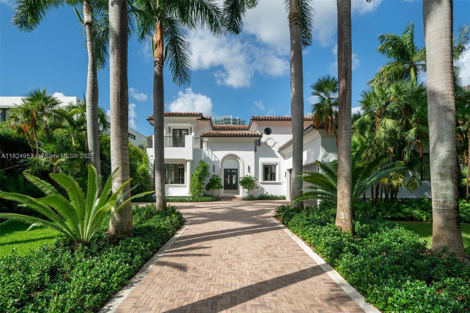 Experience timeless elegance in this beautifully renovated Italian-inspired villa, nestled along 85 feet of serene Intracoastal waters in Golden Beach. This expansive 6-bedroom, 5.5-bath home seamlessly blends modern sophistication with classic charm. The main level is graced with oversized travertine designed porcelain, leading to a spacious chefs kitchen featuring panda marble and Sub-Zero/Wolf appliances. Upstairs, rich wood floors guide you to an oversized primary suite with sitting area and dual closets. Staged by Artefacto and thoughtfully designed by Carolina Gutierrez, this Mediterranean Modern villa draws architectural inspiration from Palm Beach and Santa Monica, surrounded by lush, landscaping that creates an idyllic, serene escape, a true testament to refined, luxurious living.