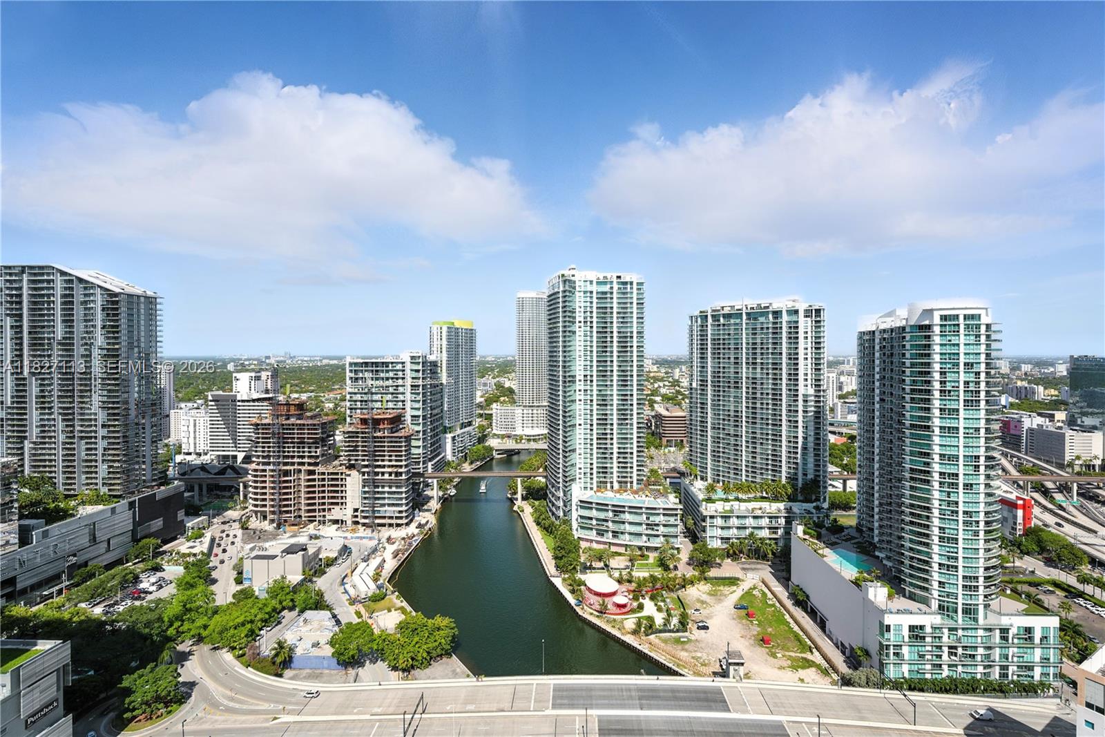 Experience elevated waterfront living at Brickell on the River, one of Brickell’s most convenient and connected addresses. This high-floor southwest corner residence stands out with floor-to-ceiling windows in every room, filling the home with natural light and showcasing panoramic city, river, and sunset views. Thoughtfully designed, the three-bedroom layout offers three private balconies, a spacious living and dining area, and a well-positioned powder bathroom ideal for entertaining. The primary suite is privately tucked away in its own wing, while the second and third bedrooms share a full bathroom. Additional upgrades include dimmable lighting, automatic shades, and updated matte fixtures throughout. A rare advantage is that this residence includes four climate-controlled storage units and one tandem parking space for two cars, offering exceptional everyday functionality rarely found in Brickell. Brickell on the River offers 24/7 security, valet service, and multiple amenity levels in the heart of the city.