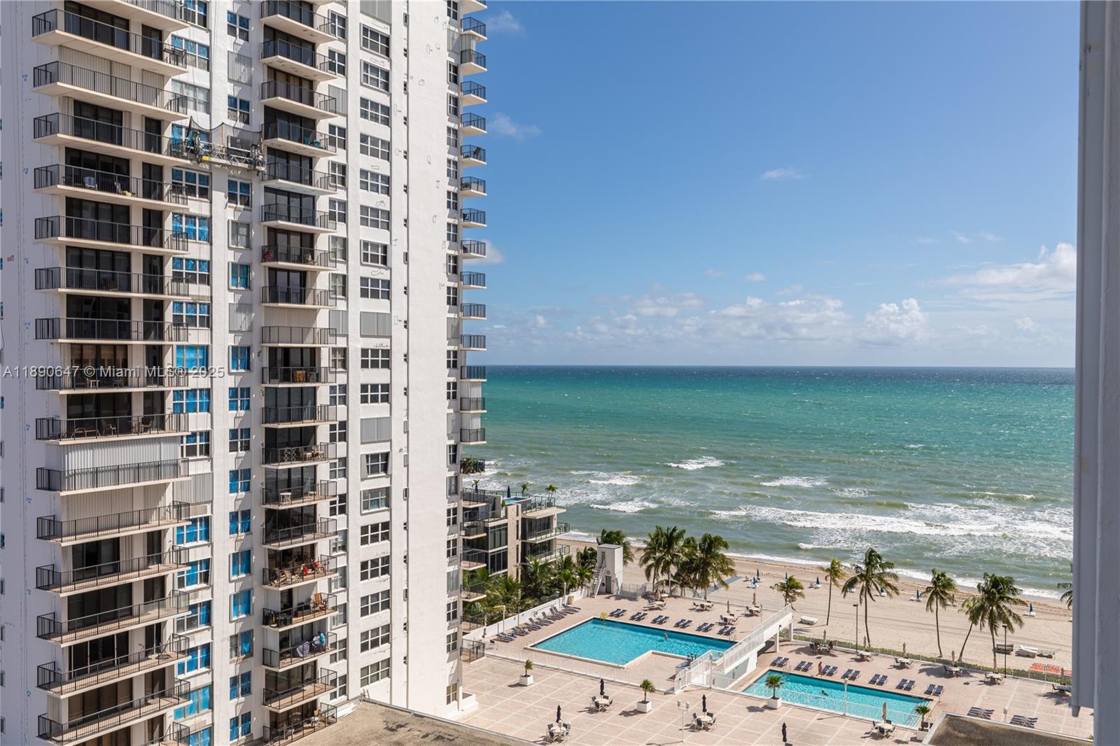 Available December 1, 2025 for seasonal or annual lease.
This bright corner unit offers a stylish urban-modern feel with beautiful views of the canal and the ocean. The open-concept layout features sleek white tile flooring throughout, hurricane-impact windows, and a spacious balcony perfect for enjoying the coastal breeze. The modern kitchen opens seamlessly to the living and dining areas, creating an inviting space for everyday Florida living.

Spacious primary bedroom with balcony access. The second bedroom includes a custom Murphy bed, offering flexibility to use the space as an office, guest room, or both.

Quadomain condo features resort-style amenities, including two pools, two fitness centers, beach service, 24/7 security, hair salon, kids room and an on-site restaurant.