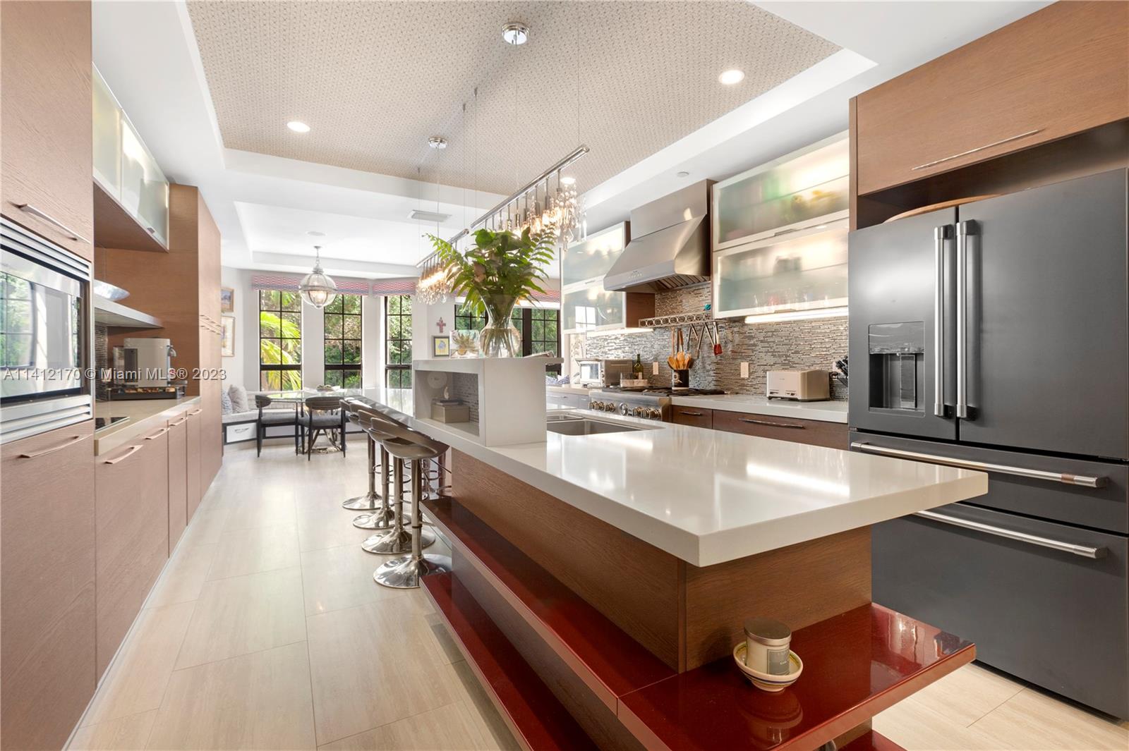 Welcome to Cloisters on the Bay Unit 204, an exceptional townhouse located in the most sought-after blocks of Coconut Grove. This grand 5,660 SqFt residence offers 3 spacious floors and a roof top overlooking a greenery oasis. Every corner of this gorgeous home was recently and meticulously envisioned by renowned interior designer, offering sophisticated details. This one-of-a kind home features 4BDs & 7BAs; office; several living & entertaining areas; high ceilings; an elevator; 2 laundry rooms; lot of storage; large balcony & garden. Cloisters is a hidden gem gated community on the Biscayne Bay with 24hs security, pool, tennis; a club house and guest parking. Explore the vibrant community with its fine dinning; eclectic shops, cafes & parks. Only a few doors from Miami’s top schools.
