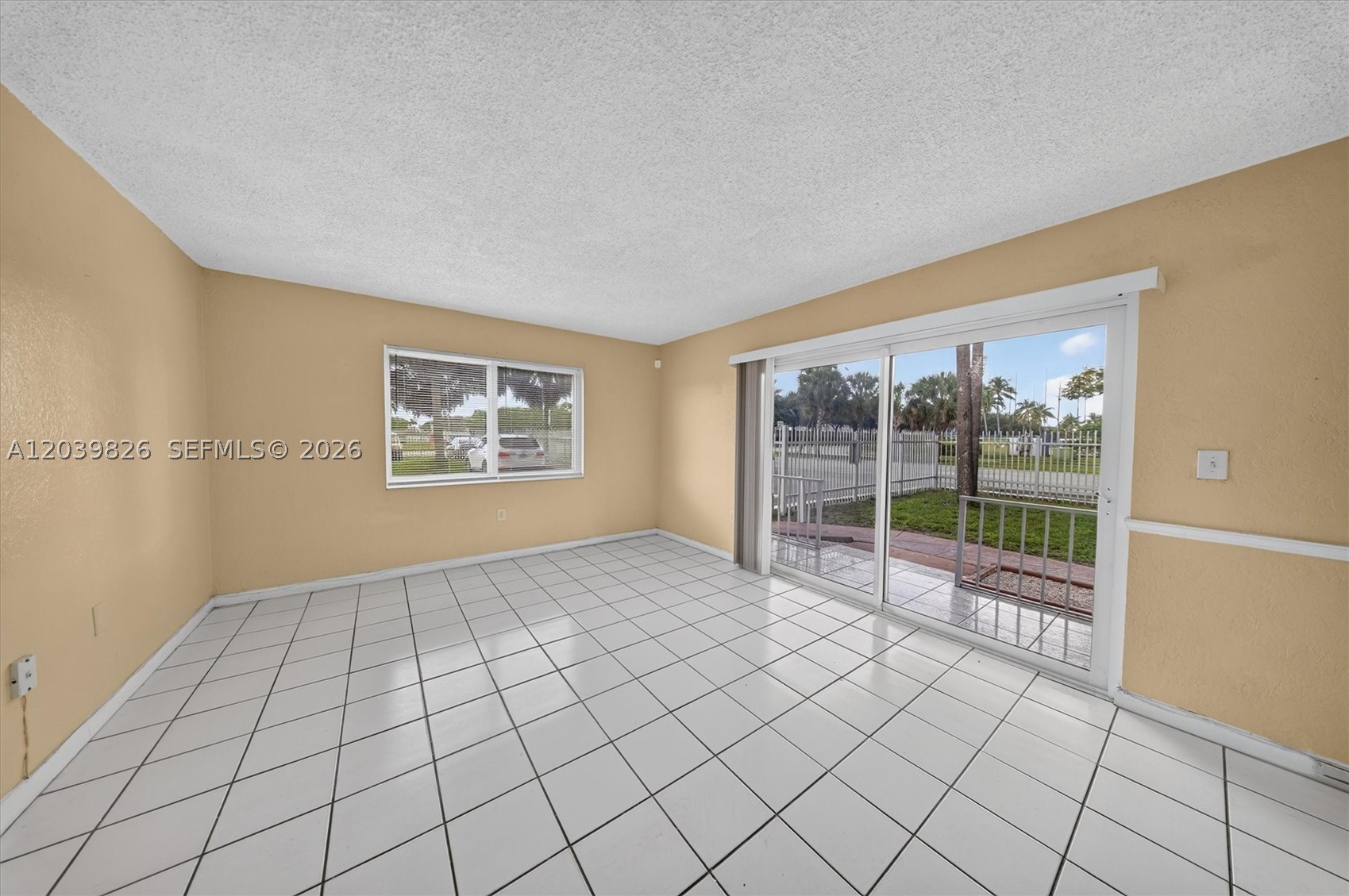 Spacious 2 bedroom and 2 bath apartment on 1st floor.High impact windows, with central air conditioning. Washer and dryer inside the unit Tile throughout the unit. Parking spaces at the building. Great location near Walmart is across the street, I-95, Turnpike, 826. INVESTORS Welcome. No rental restrictions. it could be Rented the first year owned.