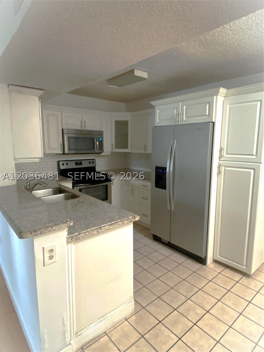 PALMS OF PEMBROKE CONDO - Residential