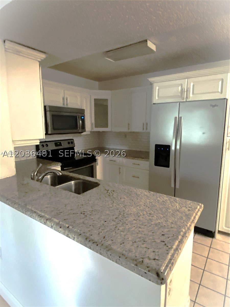 PALMS OF PEMBROKE CONDO - Residential