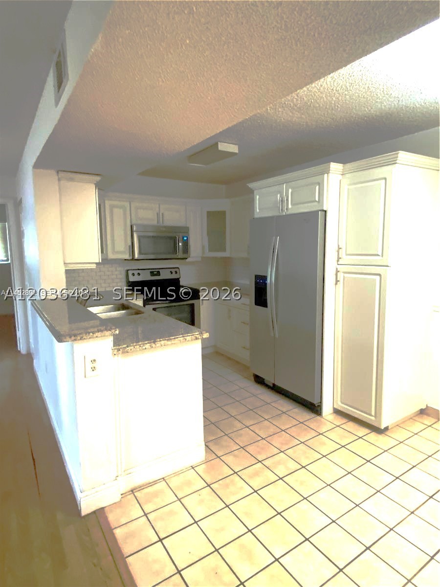 PALMS OF PEMBROKE CONDO - Residential