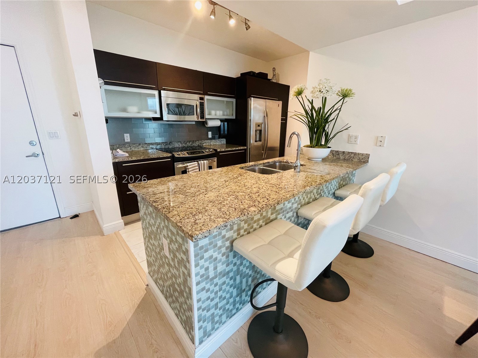 THE PLAZA 851 BRICKELL CO - Residential Lease