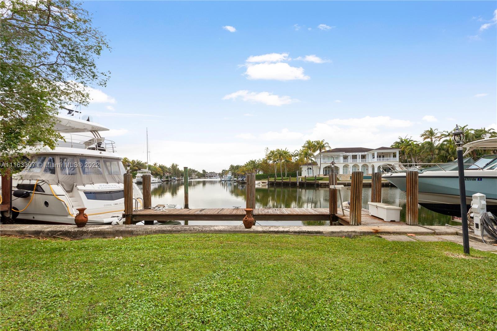 Amazing views from this one story waterfront home at the sought Old Cutler Bay guard-gated community. Water and Garden views flow perfectly through the rooms of this resort style living 6 BR & 5BA residence on a 24,900 SF lot  in Coral Gables with direct access and no bridges to the Bay. Located in one of the widest part of the canal it offers breathtaking sunset views daily, creating endless opportunities for entertaining at the twilight hours. A large dock and boat Lift offer boat lovers the opportunity to dock more than one boat. Close to top schools, great restaurants and shops.