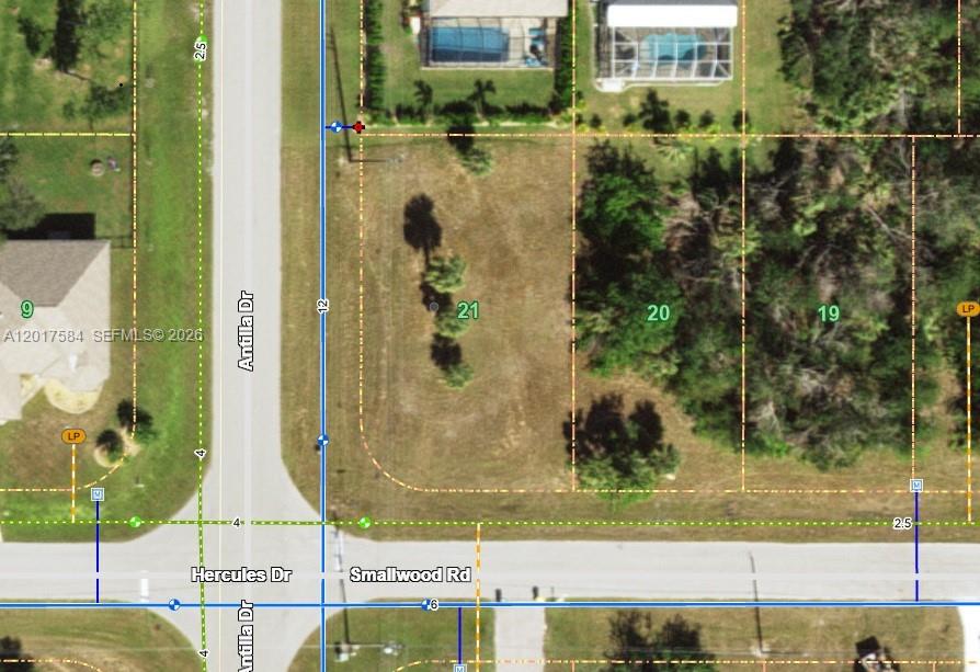 Exceptional south-facing corner lot in Rotonda West, one of Southwest Florida’s favorite coastal golf communities near Boca Grande and Englewood Beach. Surrounded by golf courses, boating, fishing, nature trails, and beautiful Gulf beaches, this property is all about the Florida lifestyle. The south-facing exposure offers great potential for natural light in your future home design and outdoor living spaces. The lot is already cleared, helping you save time, money, and headaches while you focus on designing your dream home instead of worrying about cleanup. Public water/sewer access is conveniently located right in front of the property, with nearby electricity, making the building process even more convenient. Bring your vision to life in a growing area where outdoor living, coastal charm, and future potential come together beautifully at 133 Antilla Dr, Rotonda West, FL 33947.