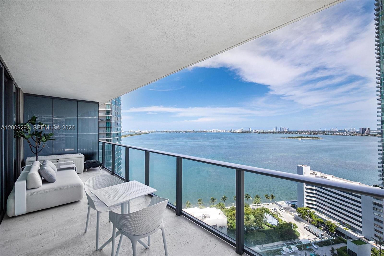 Well maintained 3-bed+den, 3.5-bath corner condo on the 21st floor of Paraiso Bay, Edgewater. Lissoni-designed. Elevated living with soaring ceilings, abundant natural light, and two private balconies offering breathtaking, unobstructed Biscayne Bay and city views. Open-concept layout includes a sleek kitchen (Sub-Zero/Bosch), versatile den, and oversized walk-in closets. Elegant marble/tile flooring blends luxury & comfort. Enjoy Paraiso Bay’s 5-star amenities: multiple pools, state-of-the-art fitness center, spa, theater, bowling alley, and tennis courts. Prime Edgewater location, steps from Amara at Paraiso, and minutes from Midtown, Wynwood, and Design District.