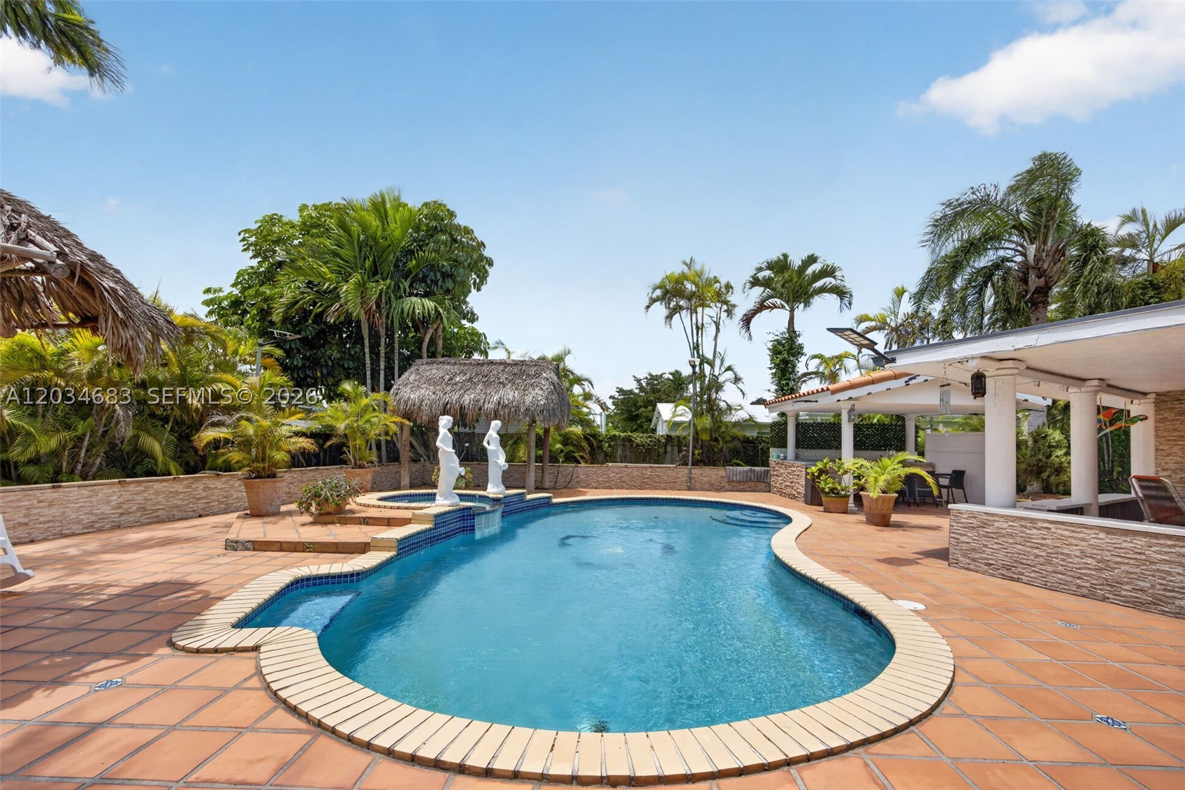 Welcome to this spacious pool home in sought-after Devon Aire! Offering over 3,300SF of living space, this 4-bedroom, 4-bath residence sits on a generous 12,975SF lot and features an open, split-bedroom floor plan designed for comfortable living and entertaining, plus 2 additional rooms, and a utility room.  The updated modern-style kitchen flows into expansive living and family areas, while the private primary suite provides a peaceful retreat.  A versatile in law suite/guest quarters with private entrance adds flexibility for extended family or income potential.  Step outside to you tropical backyard oasis complete with a resort style pool, covered patio, and plenty of space to enjoy South Florida living year-round.  Conveniently located near top-rated schools, major highways, shopping, dining, and entertainment.  A rare opportunity in the heart of Kendal!