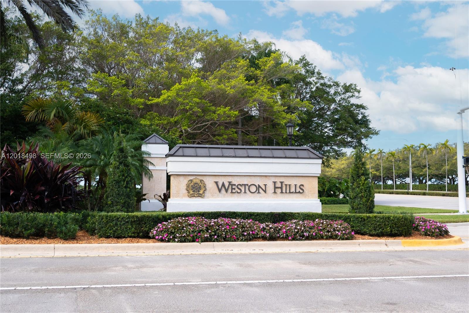 Discover this exceptional one-story estate in the prestigious gated community of Weston Hills, where elegance, comfort, and natural light come together in perfect harmony. Featuring 5 bedrooms and 4 bathrooms, this spacious residence offers an open and flowing layout ideal for both everyday living and entertaining.
Soaring ceilings and expansive living spaces create a bright and inviting atmosphere. The living room and chef’s kitchen seamlessly connect to the oversized backyard through large glass doors, blending indoor and outdoor living while offering beautiful garden views and endless possibilities to create your dream outdoor retreat, including space for a custom-designed pool.
Perfectly positioned within one of South Florida’s most sought-after communities, residents enjoy access to parks, basketball courts, lush green spaces, and world-class golf surroundings. Optional club membership provides access to elevated lifestyle amenities without mandatory fees, while the HOA remains exceptionally low.
Ideally located in Weston, known for its top-rated schools and family-friendly environment, this home offers convenient access to Miami, Fort Lauderdale, and Palm Beach. The seller is motivated and prepared for a smooth transition, making this a rare opportunity to own and personalize a truly special property in one of Broward County’s premier neighborhoods.
A timeless home filled with light, space, and potential ready to be enjoyed for years to come.