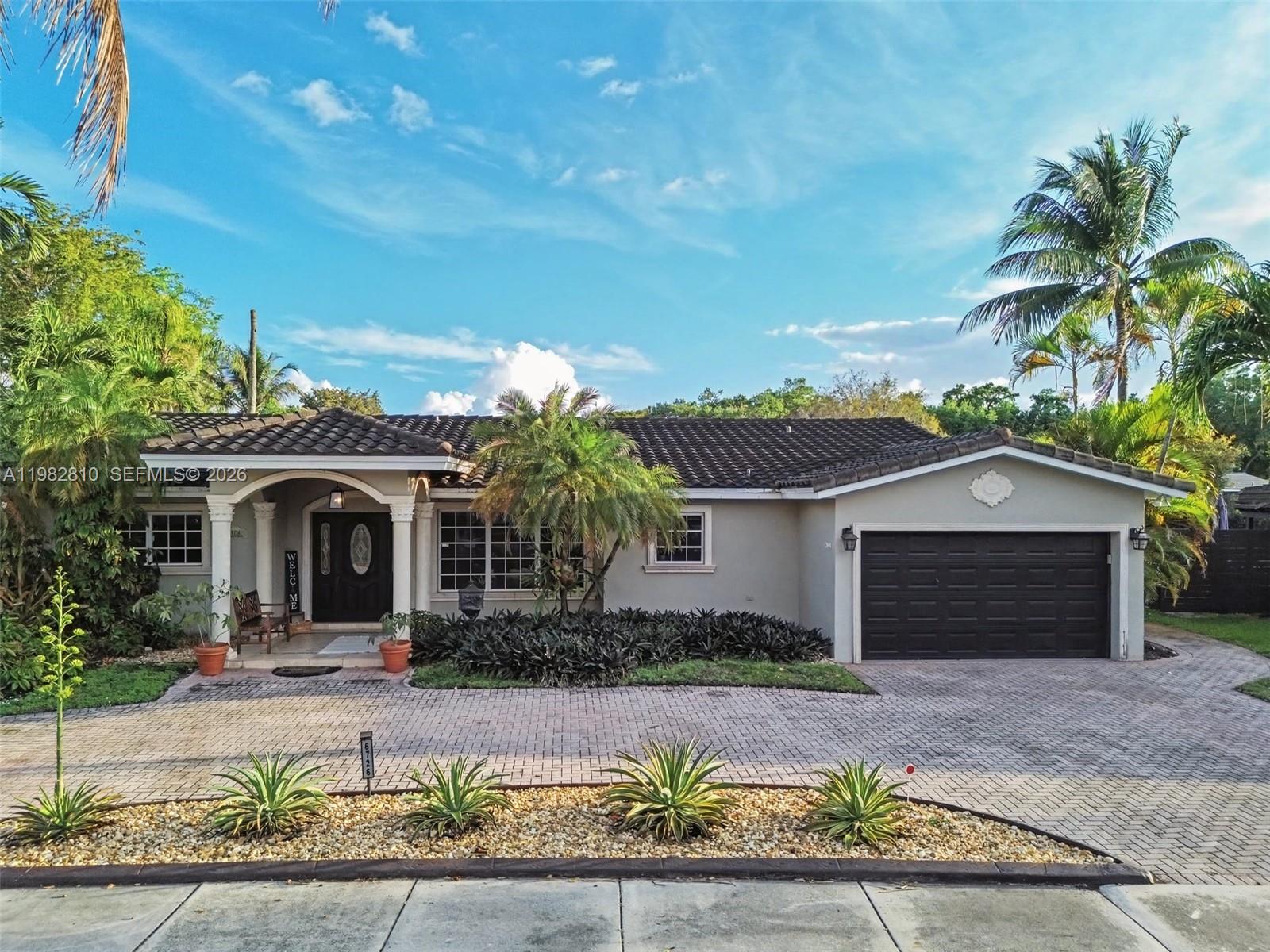 Welcome to this beautiful Miami Lakes gem! This spacious 4-bedroom, 2-bathroom home offers over 2,300 sq ft of living area on a generous 9,339 sq ft lot. The property features large principal bedrooms, a spacious kitchen perfect for entertaining, and beautifully remodeled bathrooms. Enjoy peace of mind with a 2020 barrel tile roof and a newer water heater. Step outside to your private backyard oasis with a salt-chlorinated pool and low-maintenance artificial turf, ideal for relaxation and gatherings. The home also includes a circular driveway and a 2-car garage, providing plenty of parking and convenience. Ideally located near excellent schools, shopping, dining, and the vibrant Main Street area. Don’t miss this opportunity to own a fantastic home in one of Miami Lakes’ most desirable communities.