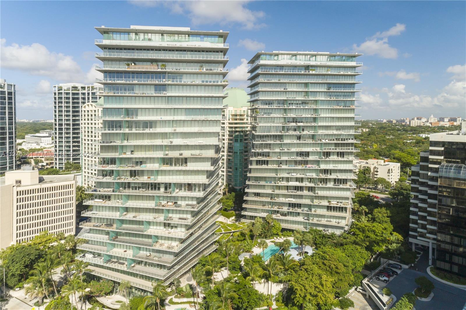 Price reduced! Enjoy luxury living at Grove at Grand Bay iconic architectural masterpiece & new landmark in privileged location in Coconut Grove. Grove at Grand Bay offers amenities such as spa, gym, restaurant, ground & roof-top pools, valet & concierge service. Private elevator opens in your residence's flowing living spaces, w/lots of natural light & vast wrap-around terrace, 12’ high sliding doors w/motorized shades & large format light Spanish Porcelanato floors throughout. The open gourmet kitchen features Miele appliances & plenty of storage. Bonus room/office. The large main suite has a massive custom-made Ornare walk-in closet & beautiful bathrm. 2 assigned parking spaces. Bookcase in living rm excluded from sale. 3D video & flr plan included