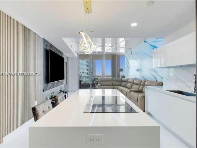 Experience elevated urban living at Paramount Miami Worldcenter in the heart of Downtown Miami. This beautifully remodeled 1-bedroom, 2-bath residence has been thoughtfully customized by the owner with upgraded finishes and refined design details throughout. The spacious layout offers an open-concept living and dining area, a modernized kitchen with premium appliances, and a generously sized primary suite complemented by a full second bath, ideal for guests or a home office setup.
Paramount Miami Worldcenter is known for its unmatched amenities, offering one of the most robust lifestyle experiences in the city. Residents enjoy multiple resort-style pools, a state-of-the-art fitness center, spa facilities, tennis and basketball courts, soccer field, boxing studio, game room, golf simulator, and more - all within a secure, luxury high-rise setting.
Located steps from shopping, dining, entertainment, and just minutes from Brickell, Wynwood, Miami Beach, and the airport, this residence offers the perfect blend of comfort, style, and convenience in one of Miami’s most dynamic neighborhoods.